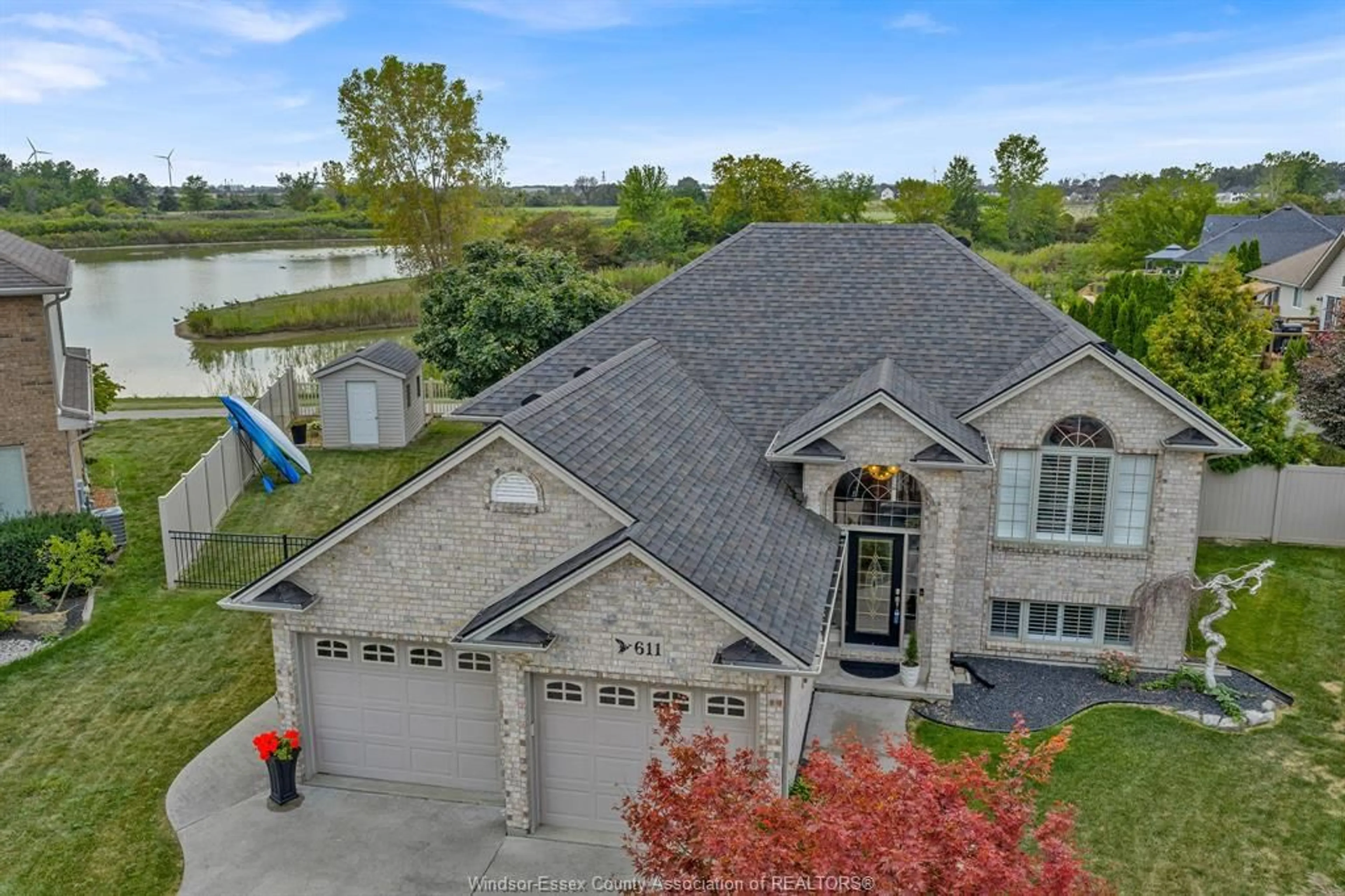 A pic from outside/outdoor area/front of a property/back of a property/a pic from drone, water/lake/river/ocean view for 611 ROBERT Crt, Belle River Ontario N0R 1A0