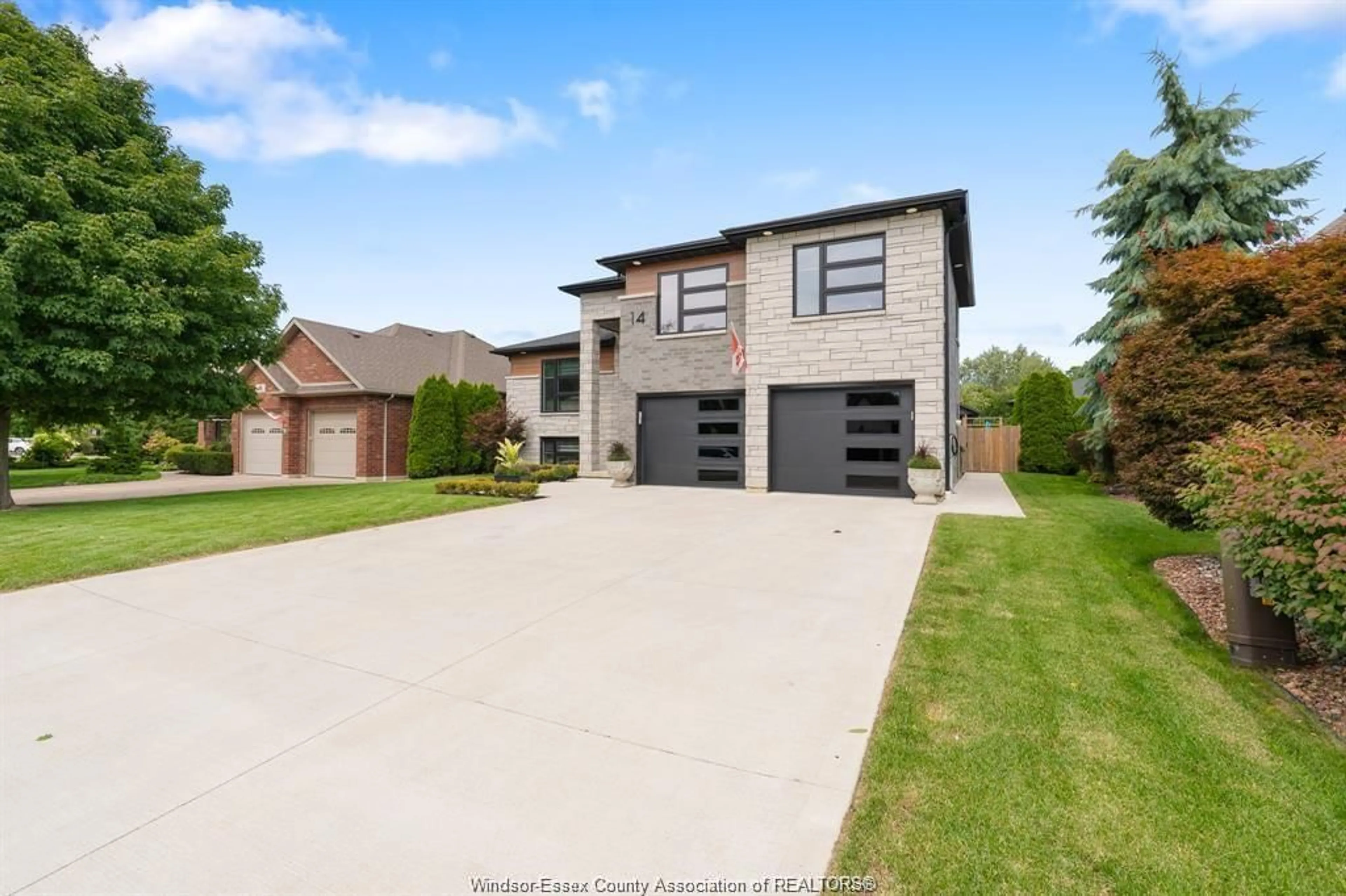 Home with brick exterior material, street for 14 PRIMROSE Dr, Kingsville Ontario N9Y 0A3