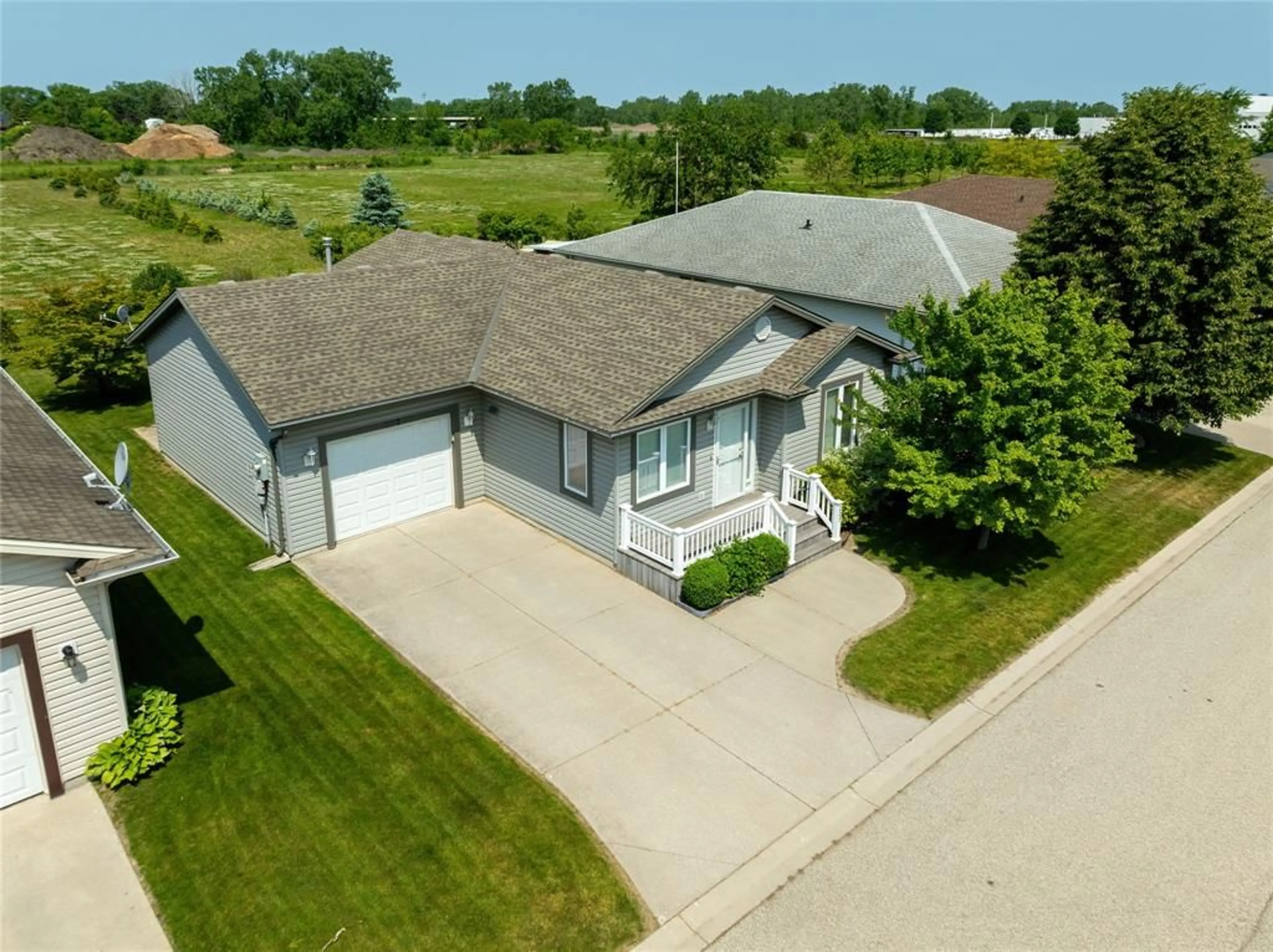 A pic from outside/outdoor area/front of a property/back of a property/a pic from drone, street for 1940 LONDON Line #207, Sarnia Ontario N7W 1B5