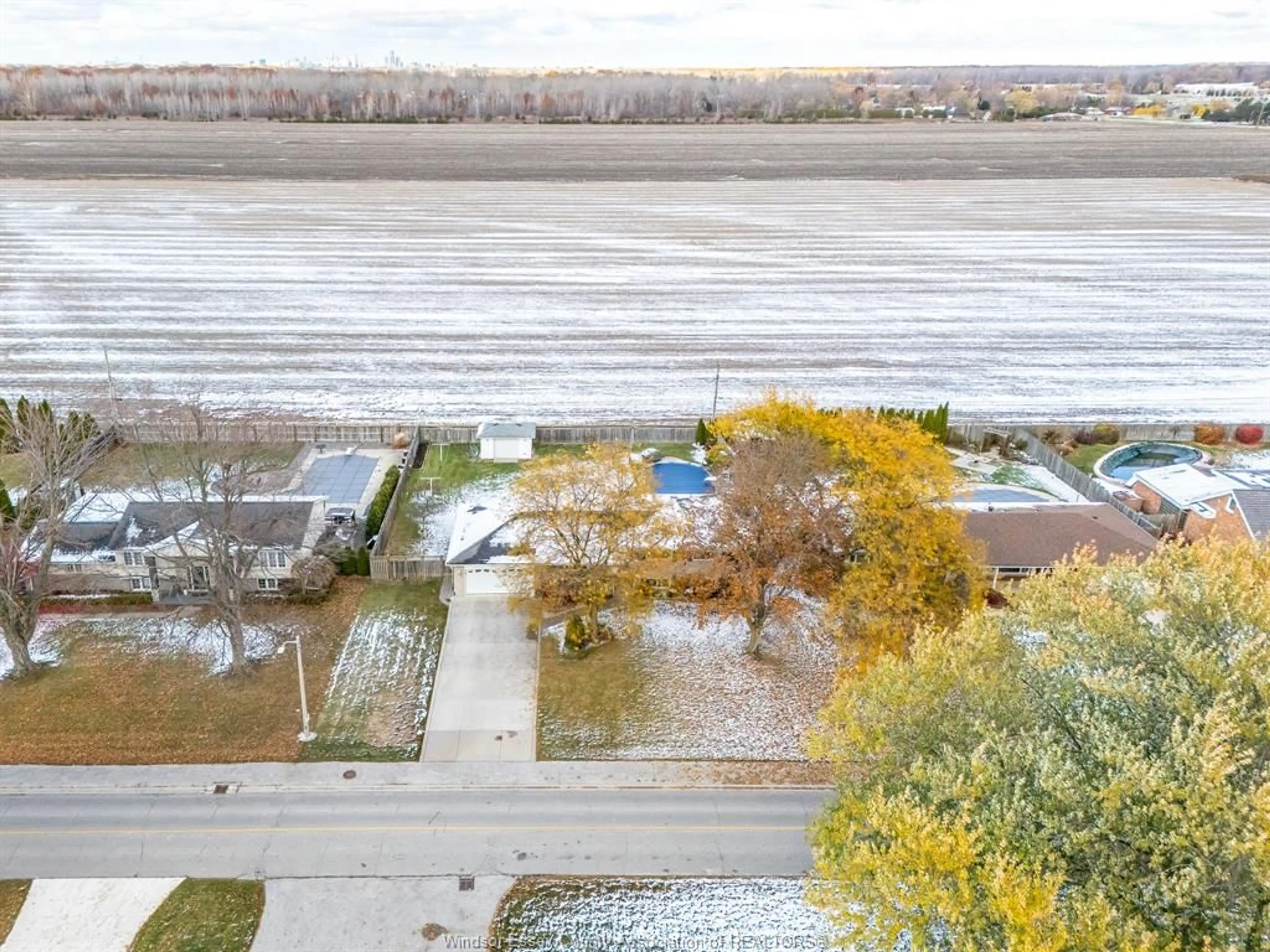 A pic from outside/outdoor area/front of a property/back of a property/a pic from drone, water/lake/river/ocean view for 1530 Golfview Dr, LaSalle Ontario N9J 1Y9