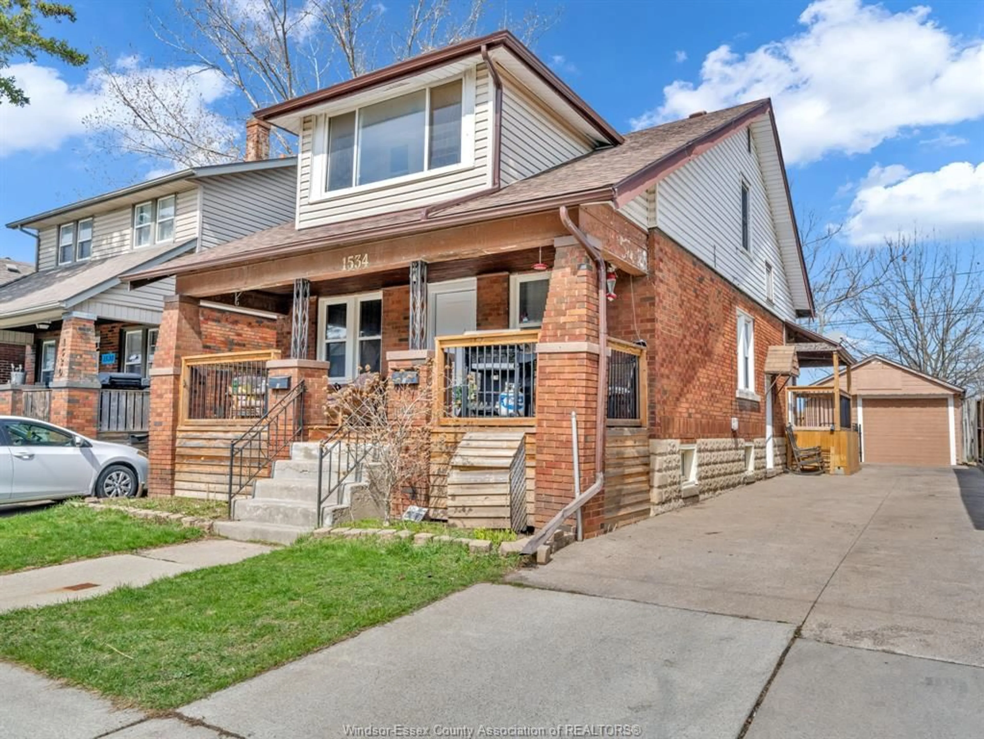 Home with brick exterior material, street for 1534 Lillian Ave, Windsor Ontario N8X 4A8