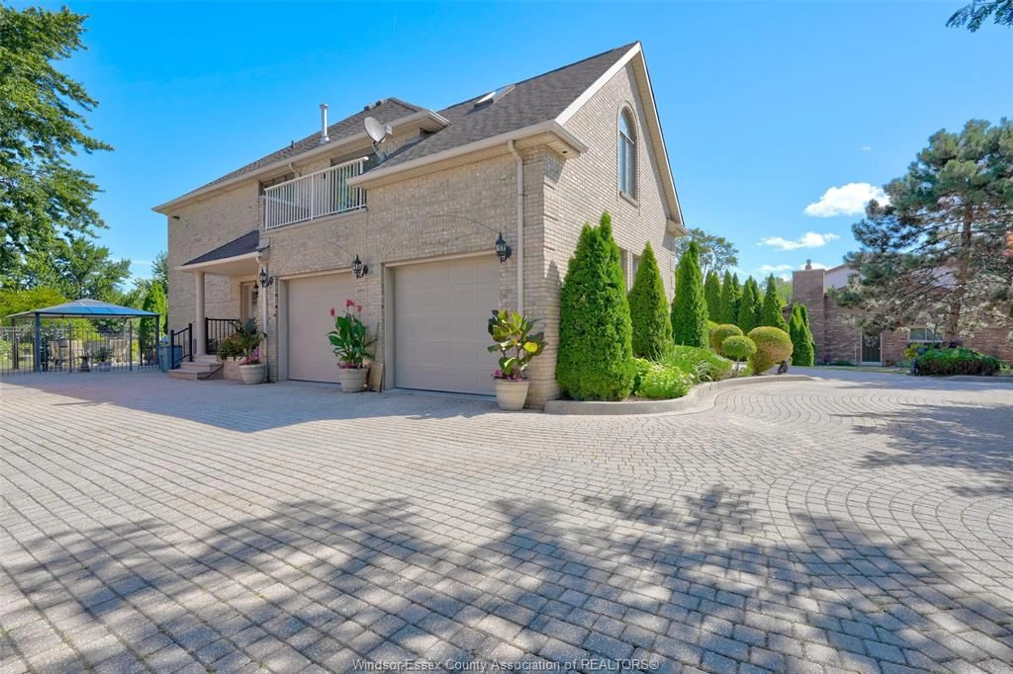 Home with brick exterior material, street for 492 OLD TECUMSEH, Lakeshore Ontario N8N 3S8