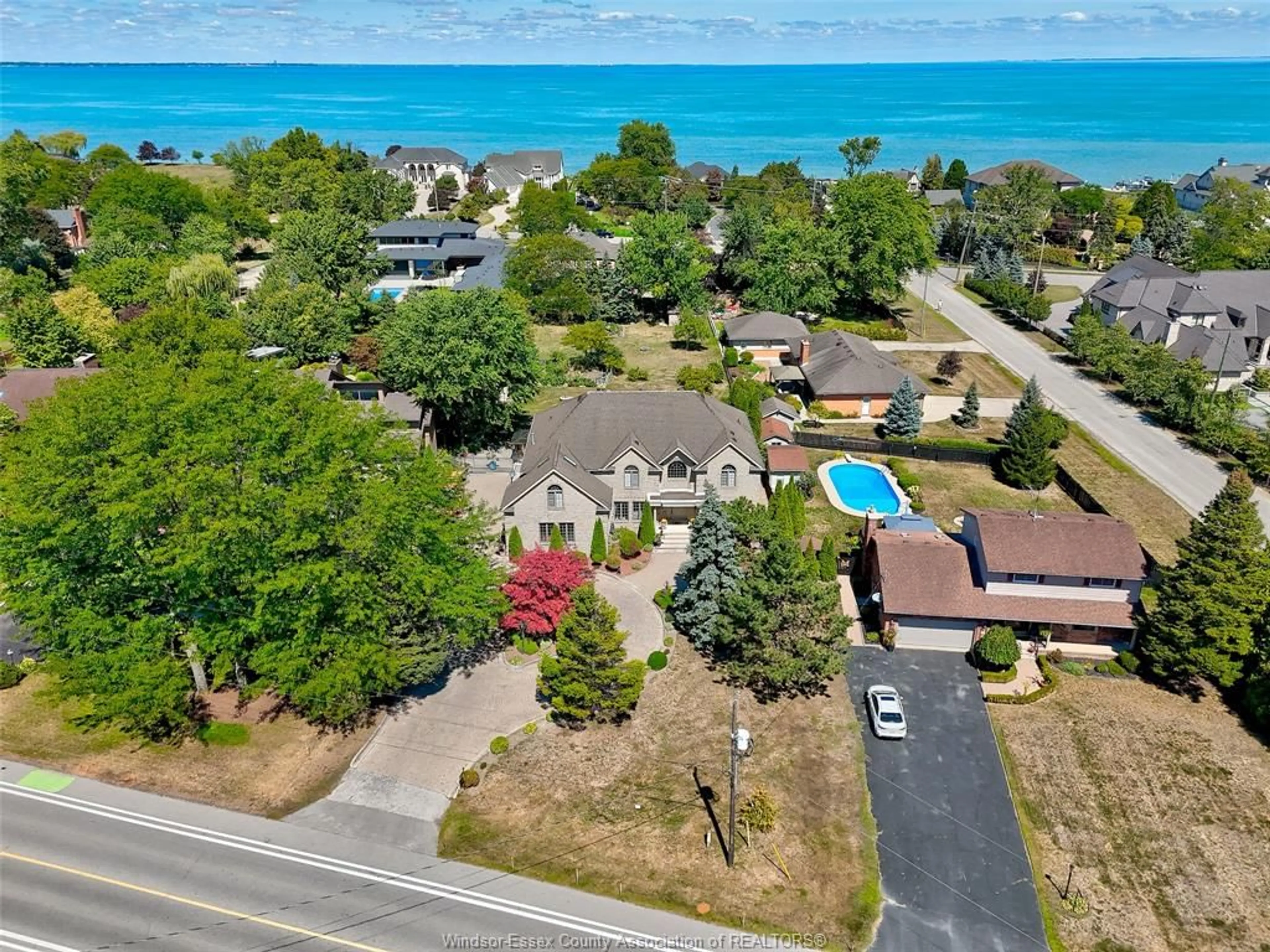 A pic from outside/outdoor area/front of a property/back of a property/a pic from drone, water/lake/river/ocean view for 492 OLD TECUMSEH, Lakeshore Ontario N8N 3S8