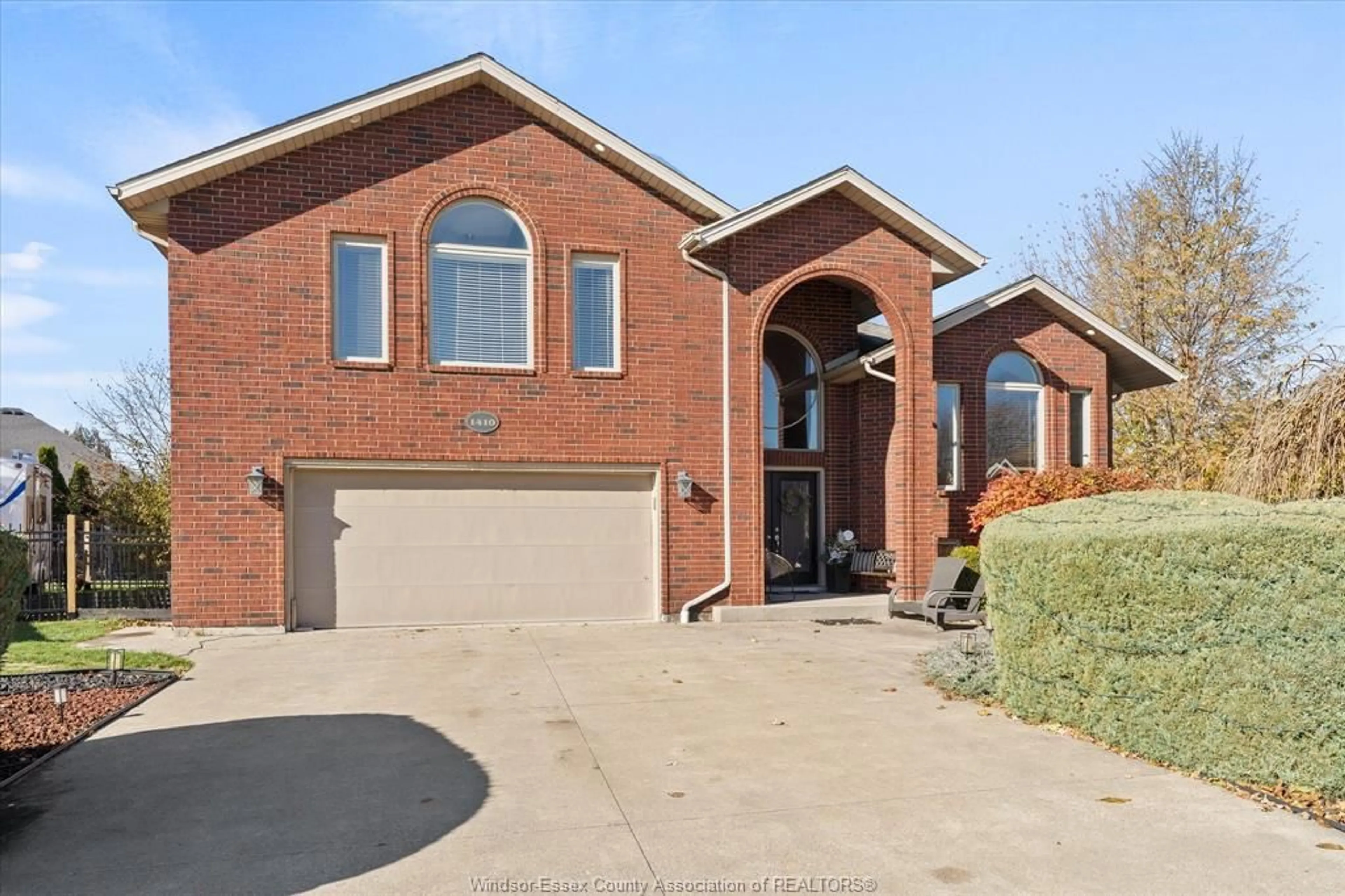 Home with brick exterior material, street for 1410 McMahon Crescent, Lakeshore Ontario N8L 0R1