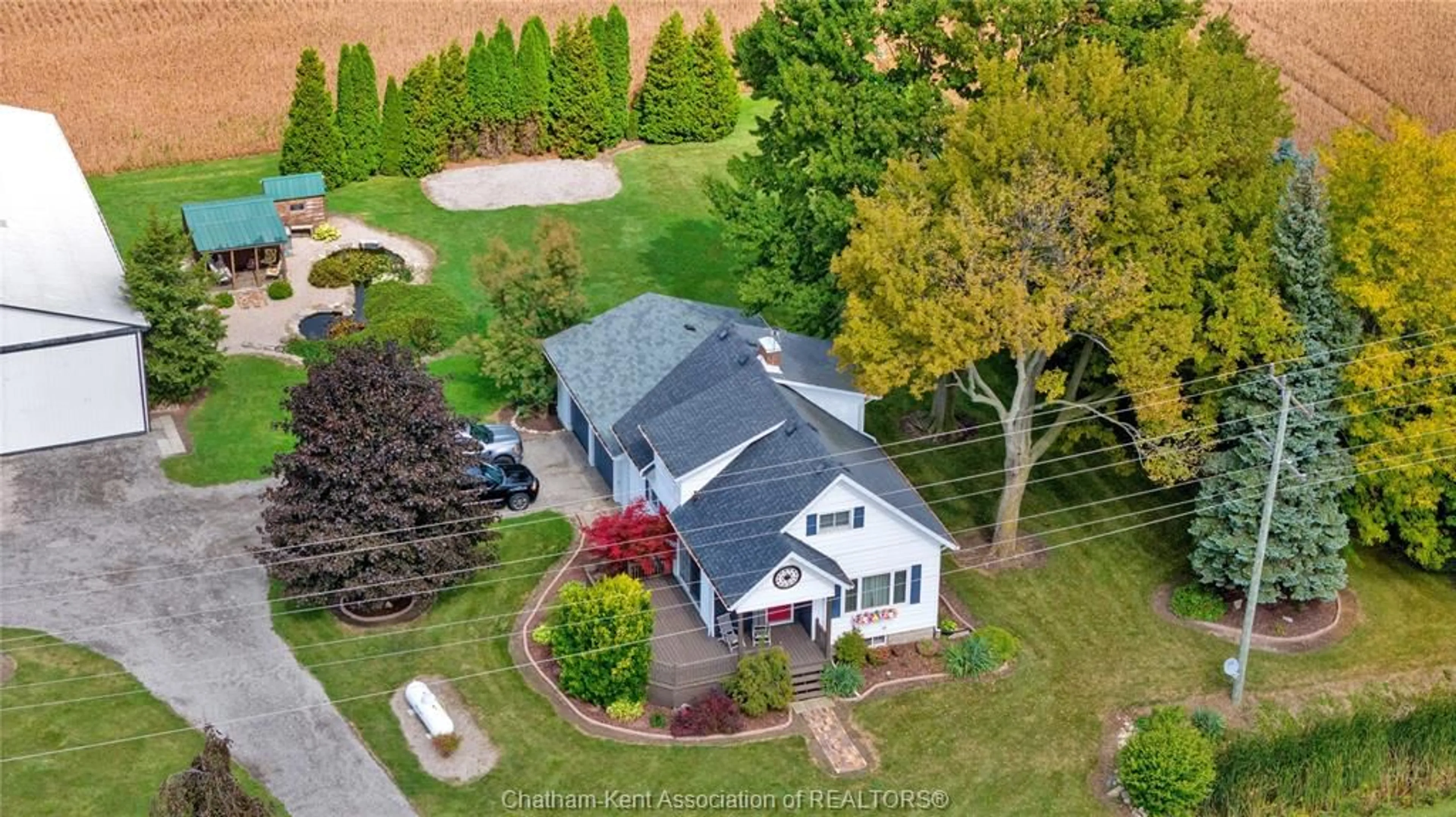 A pic from outside/outdoor area/front of a property/back of a property/a pic from drone, street for 7703 Base Line Rd, Wallaceburg Ontario N8A 4L3