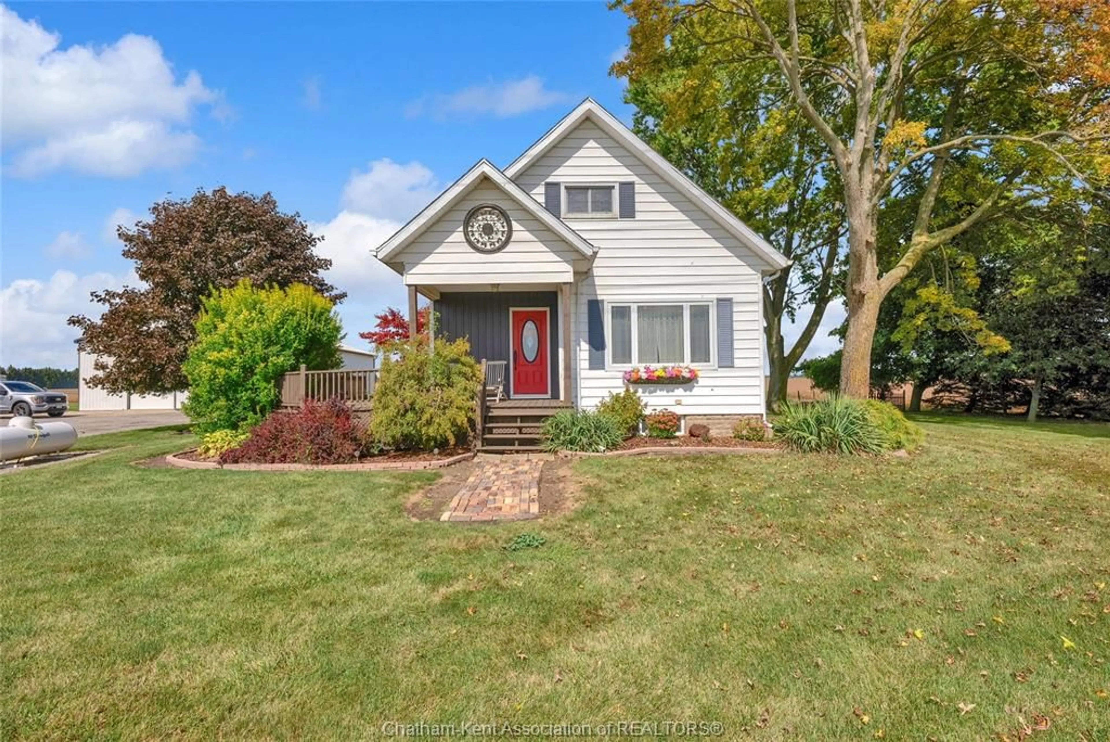 Home with vinyl exterior material, street for 7703 Base Line Rd, Wallaceburg Ontario N8A 4L3