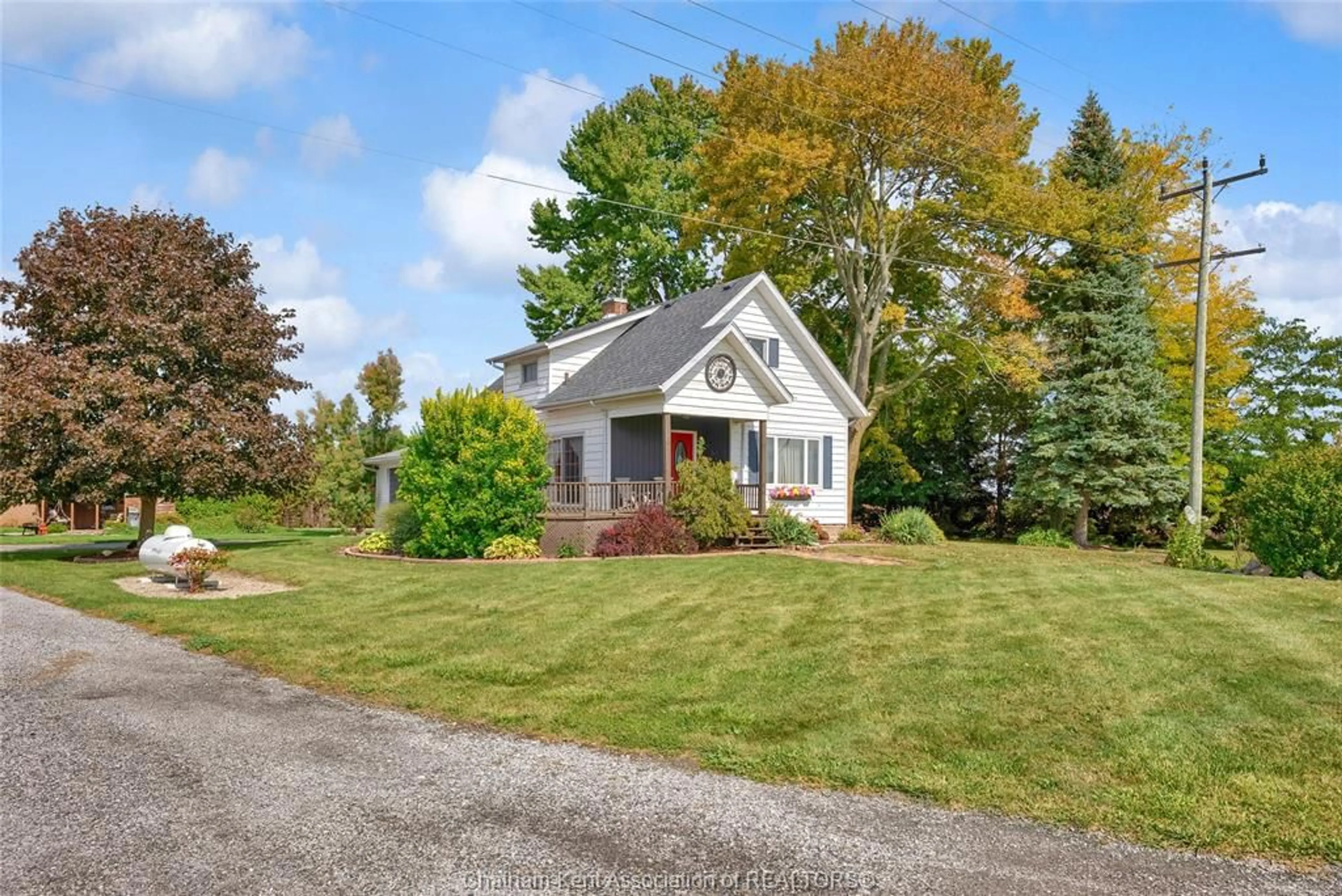 Home with vinyl exterior material, street for 7703 Base Line Rd, Wallaceburg Ontario N8A 4L3