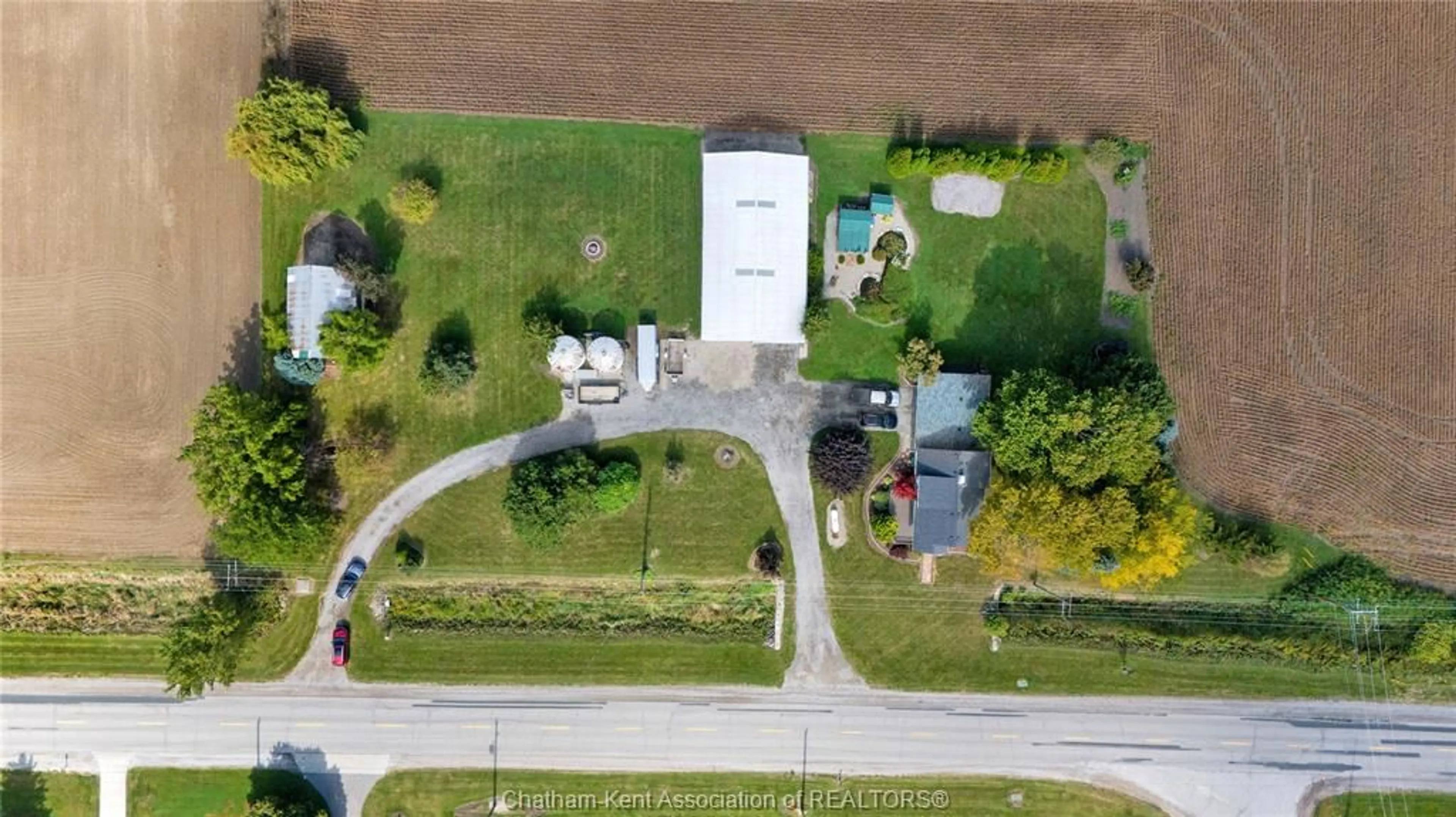 A pic from outside/outdoor area/front of a property/back of a property/a pic from drone, street for 7703 Base Line Rd, Wallaceburg Ontario N8A 4L3