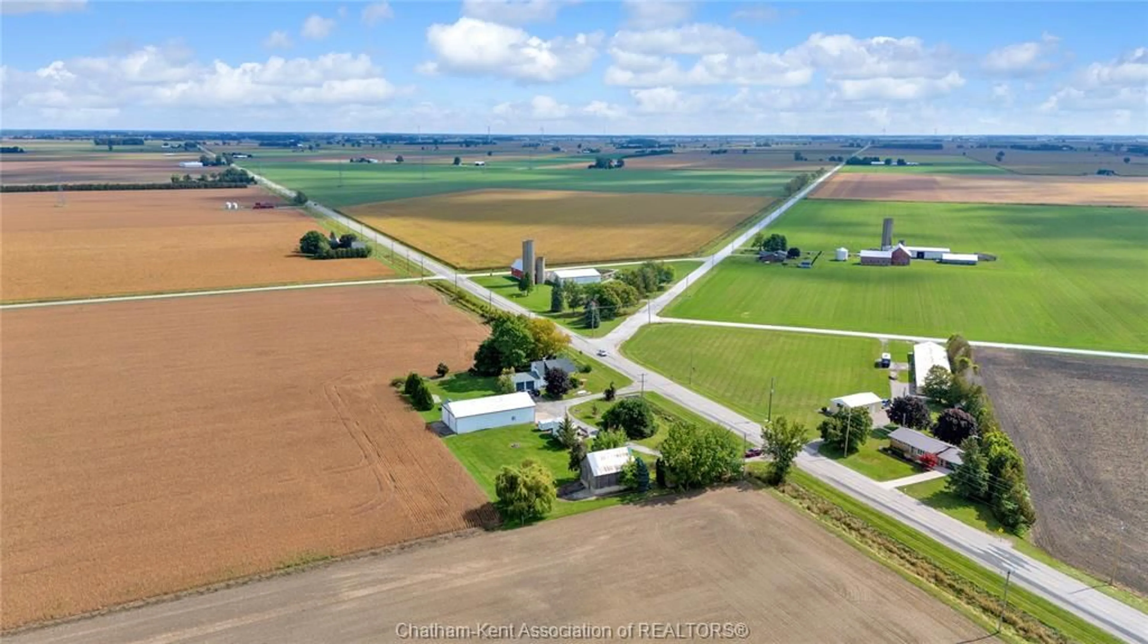 A pic from outside/outdoor area/front of a property/back of a property/a pic from drone, street for 7703 Base Line Rd, Wallaceburg Ontario N8A 4L3