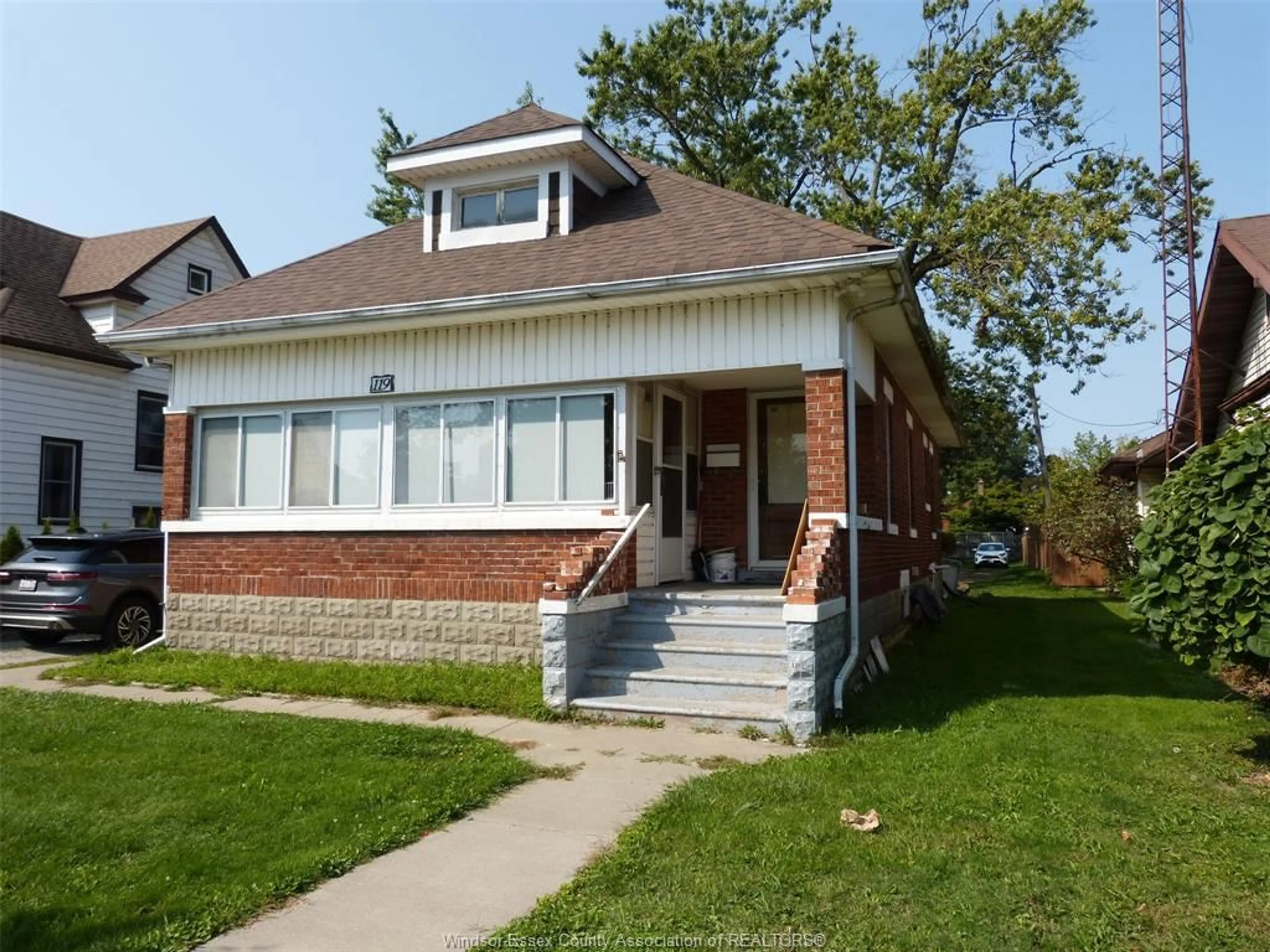 Home with brick exterior material, street for 119 ERIE St, Leamington Ontario N8H 3B4