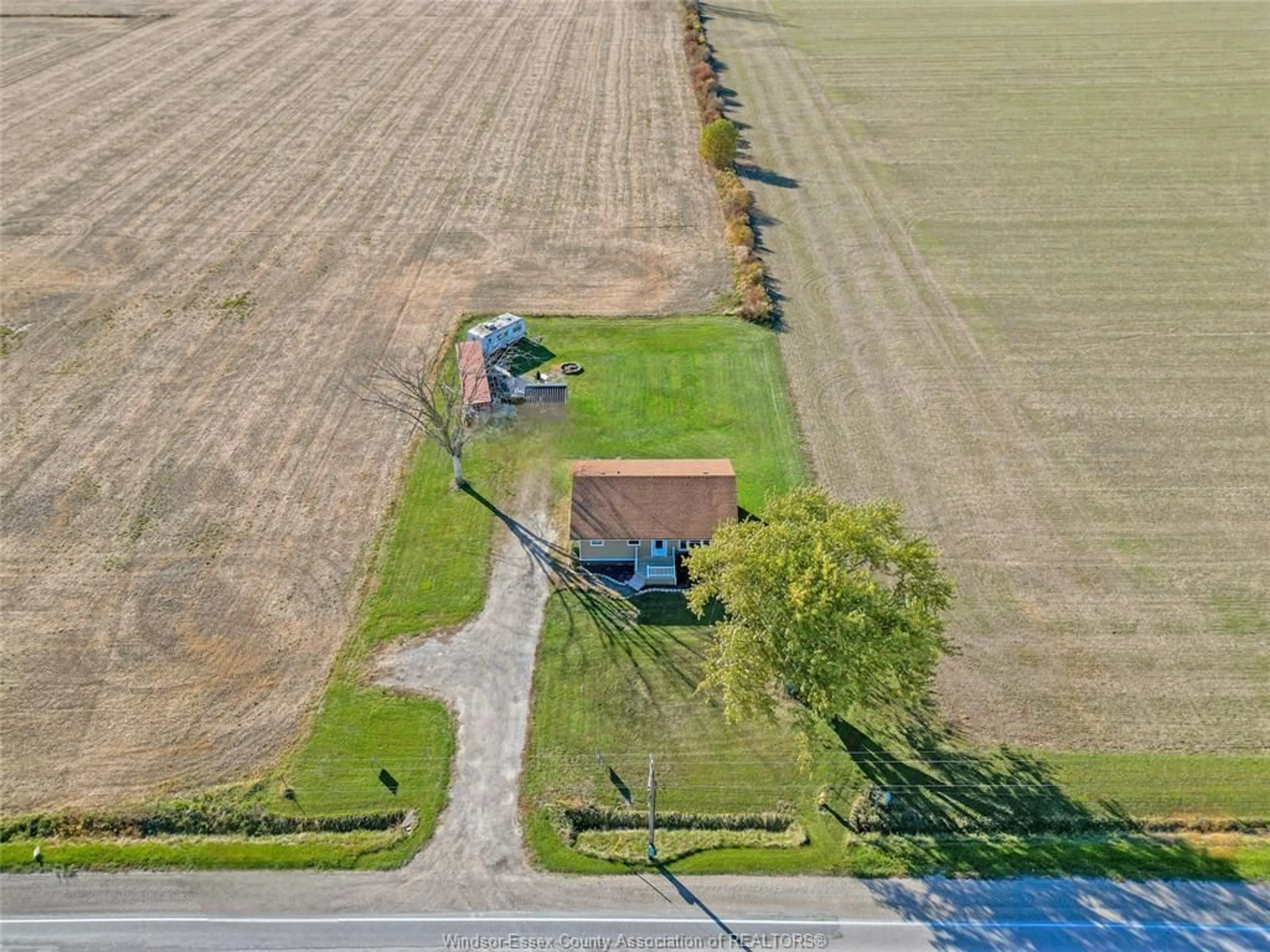 A pic from outside/outdoor area/front of a property/back of a property/a pic from drone, street for 9688 WALKER Rd, McGregor Ontario N0R 1J0
