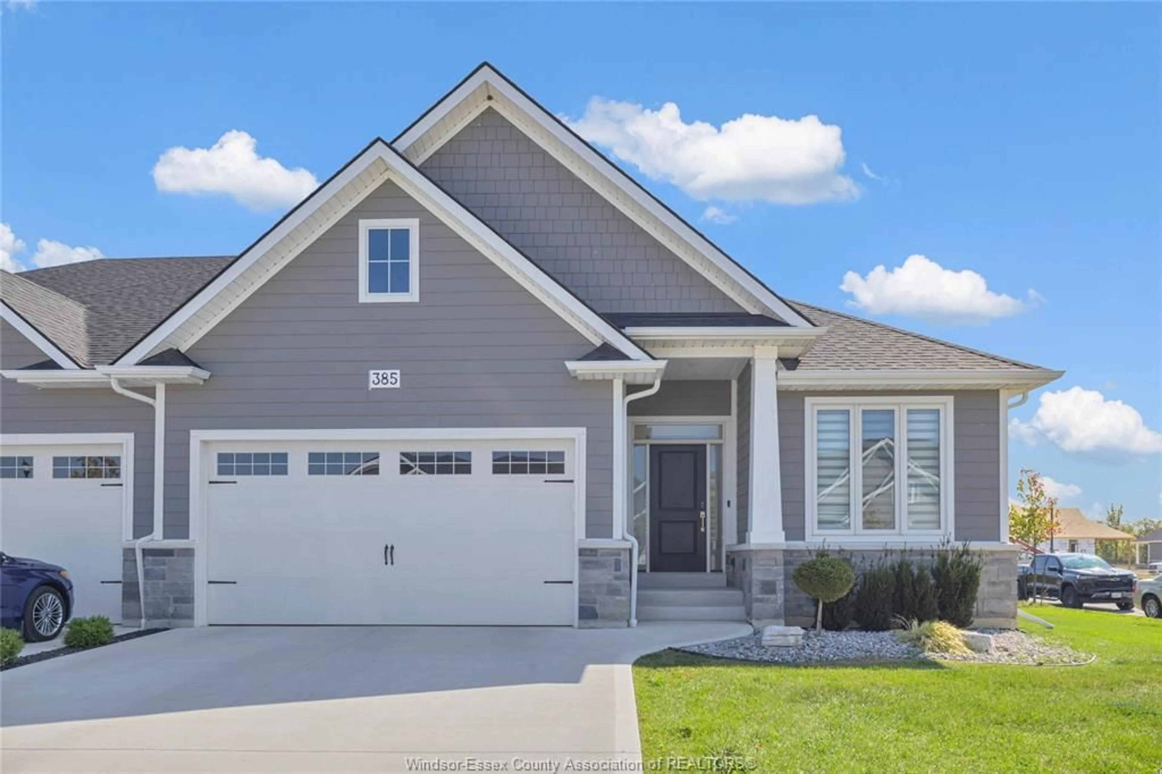 Home with vinyl exterior material, street for 385 MATESE St, Lakeshore Ontario N8L 0X5