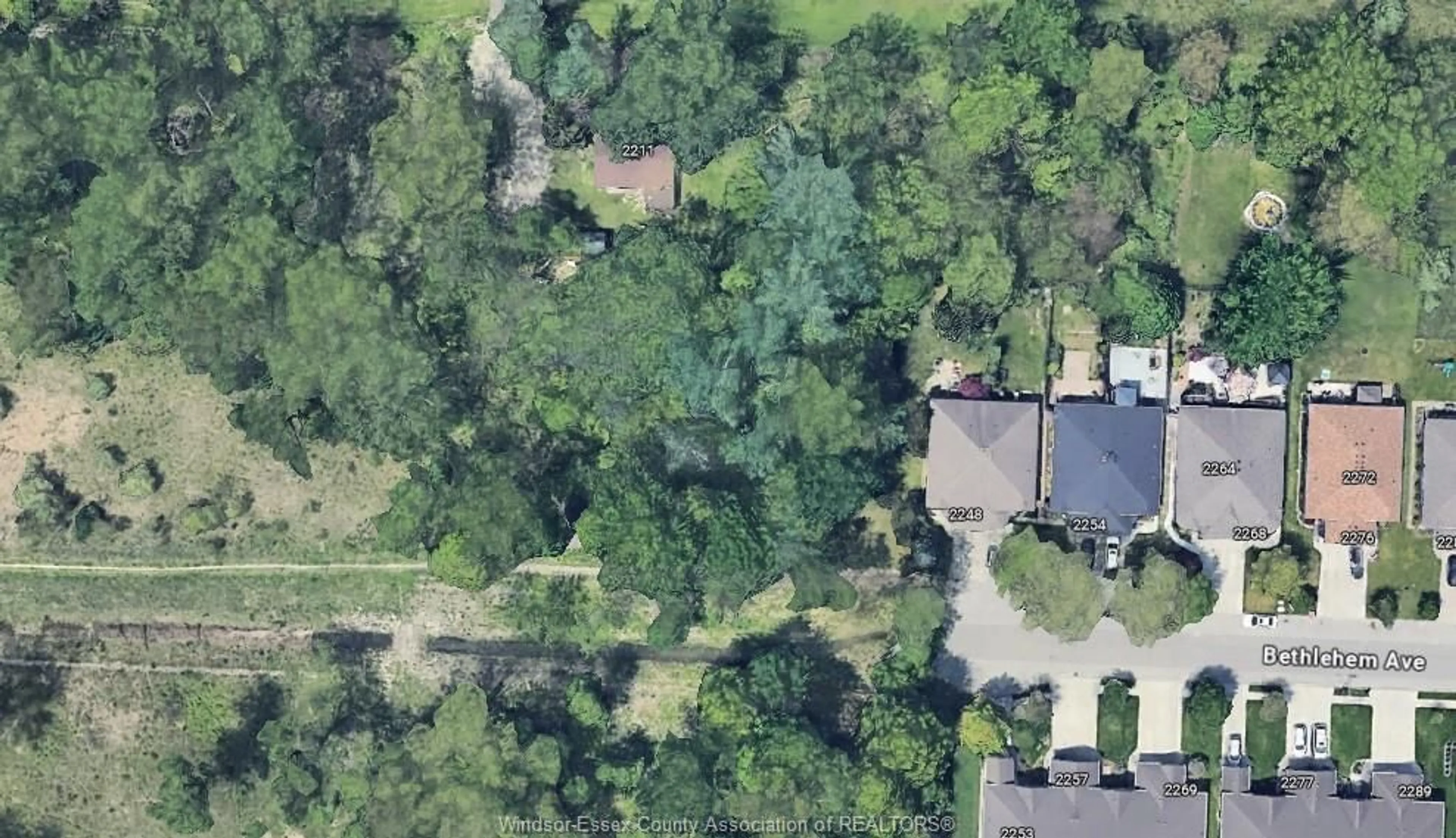 A pic from outside/outdoor area/front of a property/back of a property/a pic from drone, forest/trees view for V/L Bethlehem, Windsor Ontario N9E 4W7