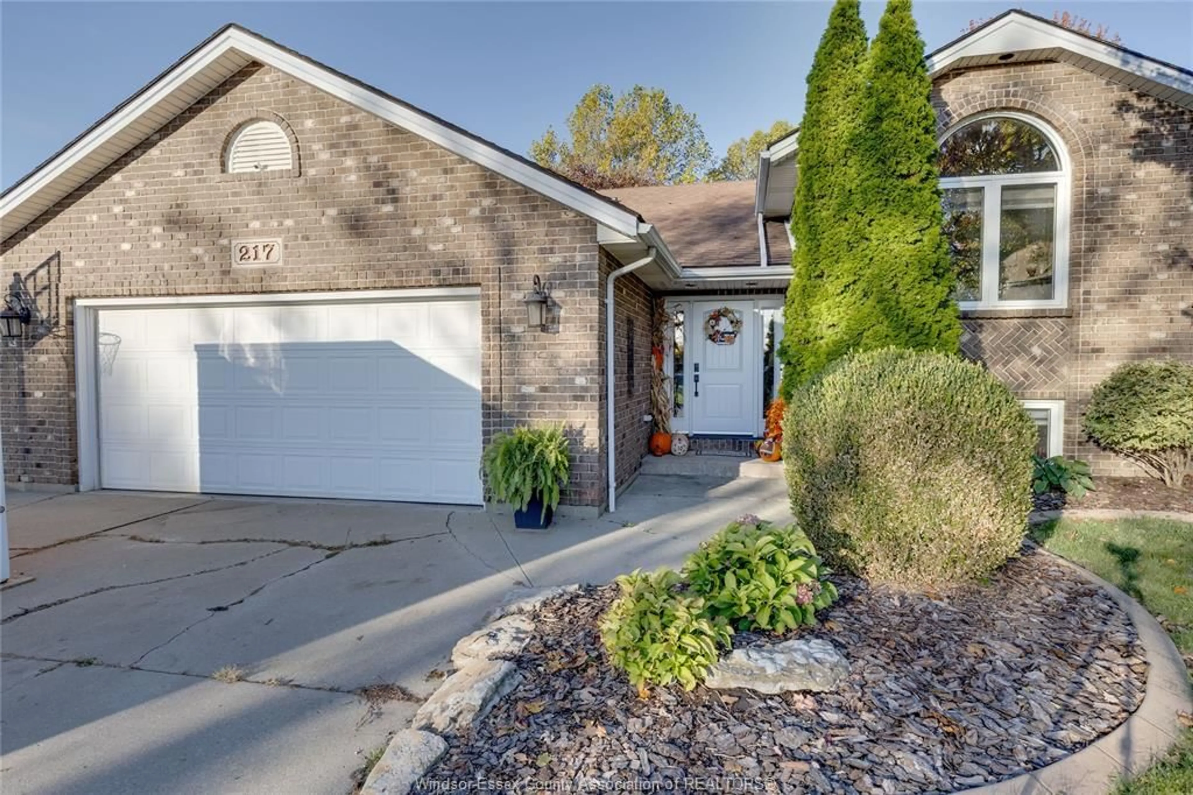 Home with brick exterior material, street for 217 BEECHWOOD Dr, Lakeshore Ontario N0R 1A0