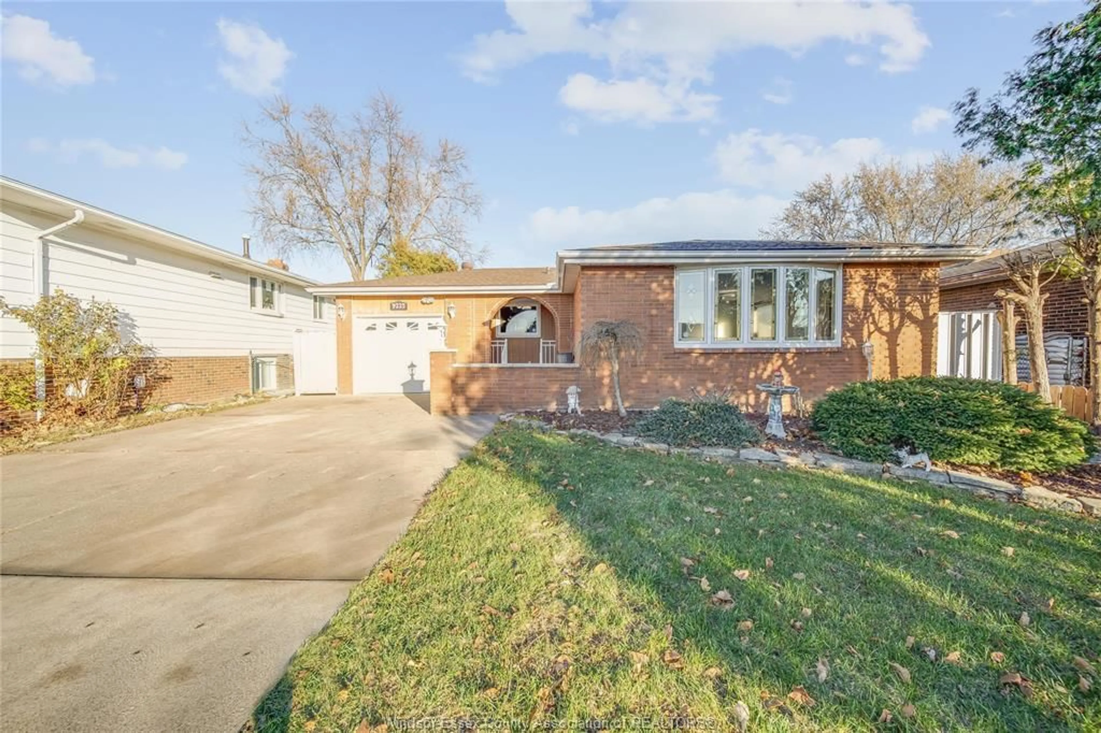 Home with brick exterior material, street for 9223 ESPLANADE Dr, Windsor Ontario N8R 1J2