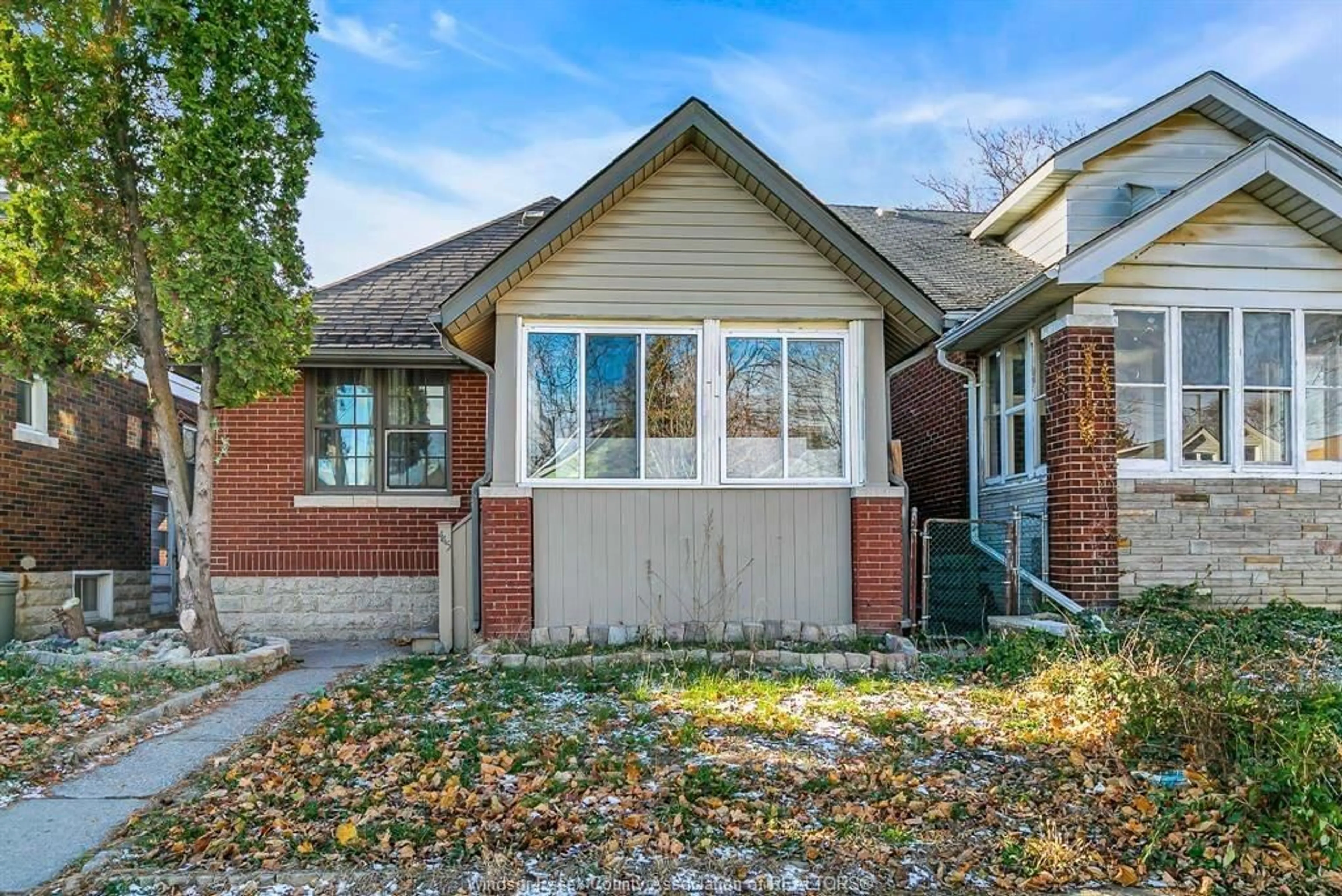 Home with brick exterior material, street for 445 MCKAY Ave, Windsor Ontario N9B 1Z7