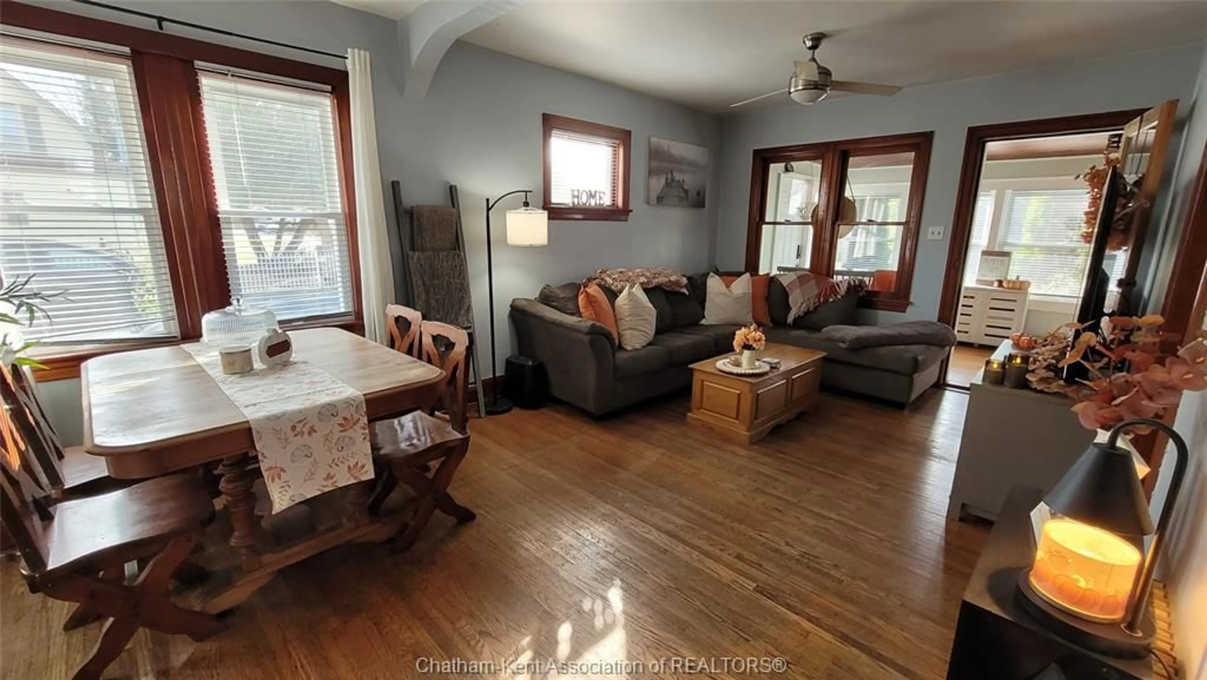 Living room with furniture, wood/laminate floor for 412 Lafontaine St, Wallaceburg Ontario N8A 4J2