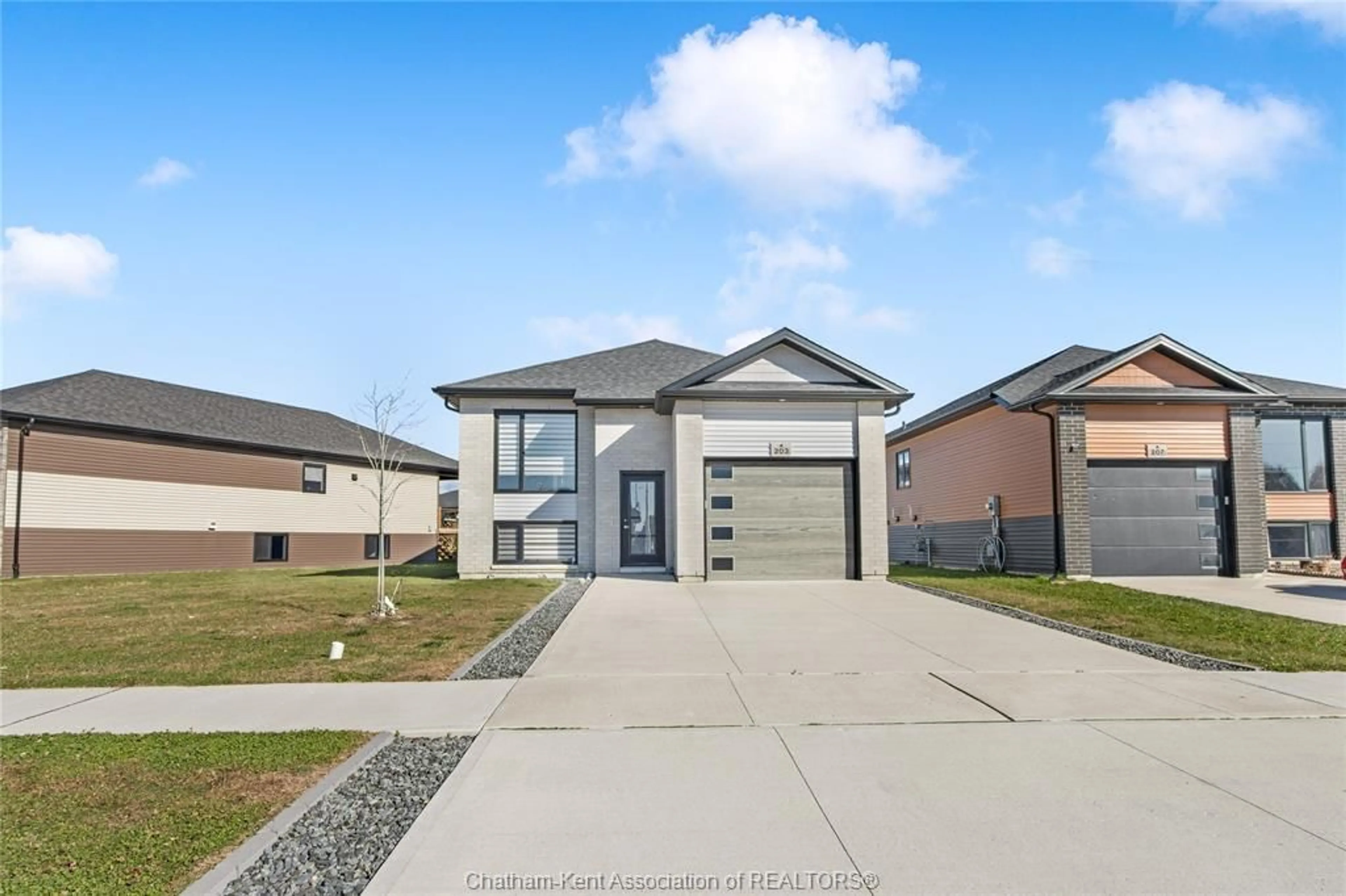 Home with brick exterior material, street for 203 MOONSTONE Cres, Chatham Ontario N7M 0S1