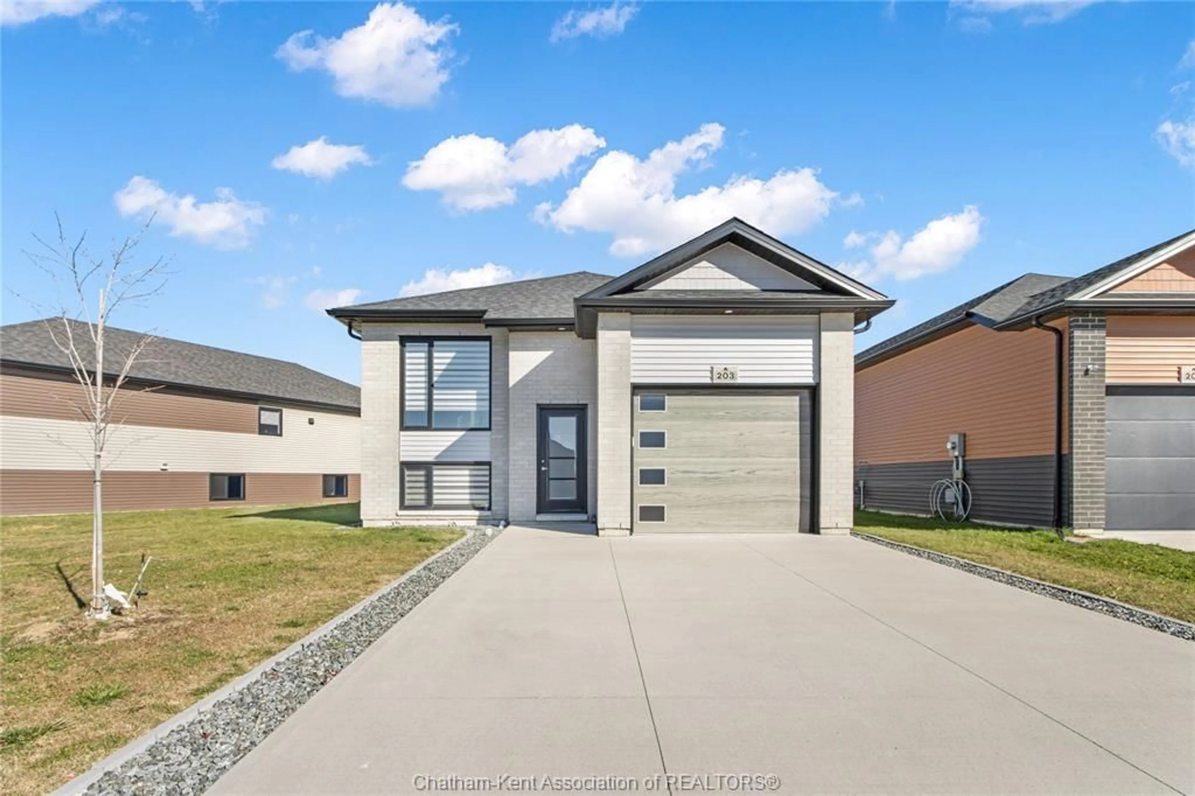 Home with brick exterior material, street for 203 MOONSTONE Cres, Chatham Ontario N7M 0S1