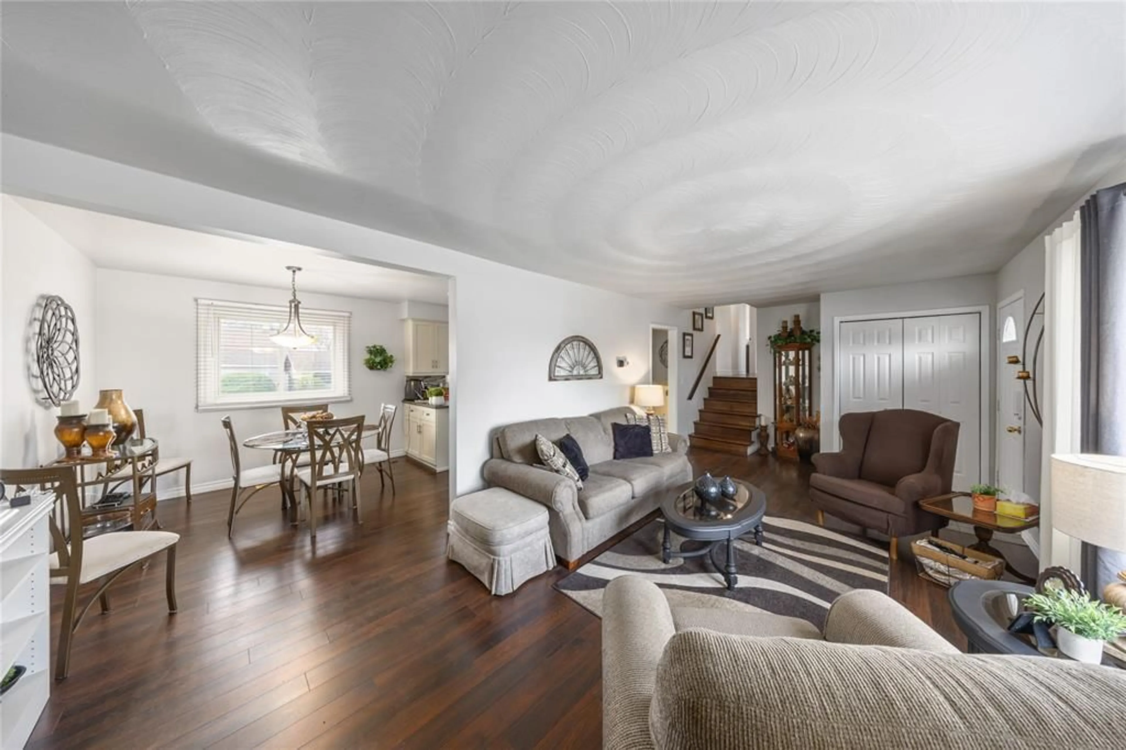 Living room with furniture, wood/laminate floor for 671 NELSON St, Wallaceburg Ontario N8A 4H5