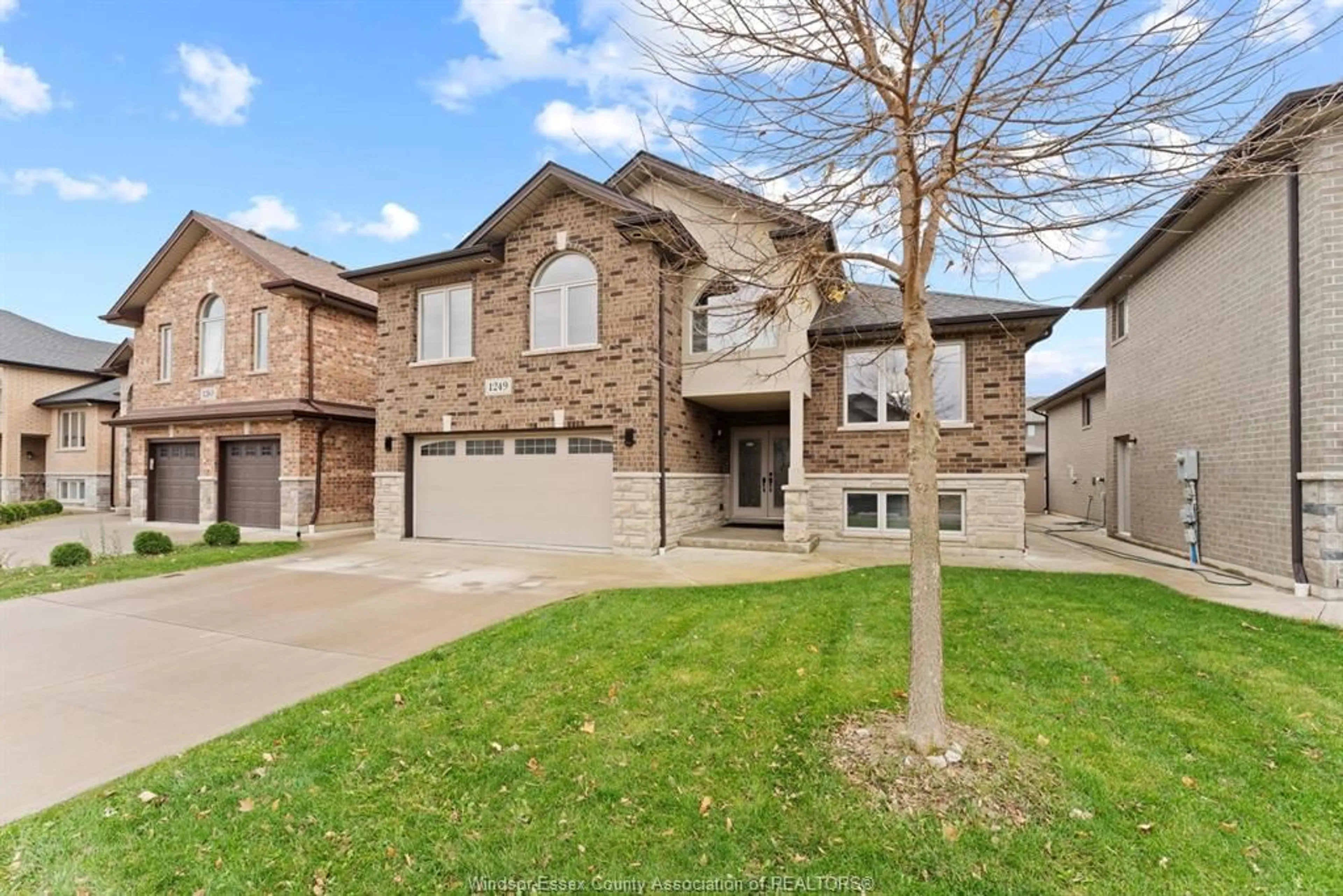 Home with brick exterior material, street for 1249 CANCUN, Windsor Ontario N9G 0B2