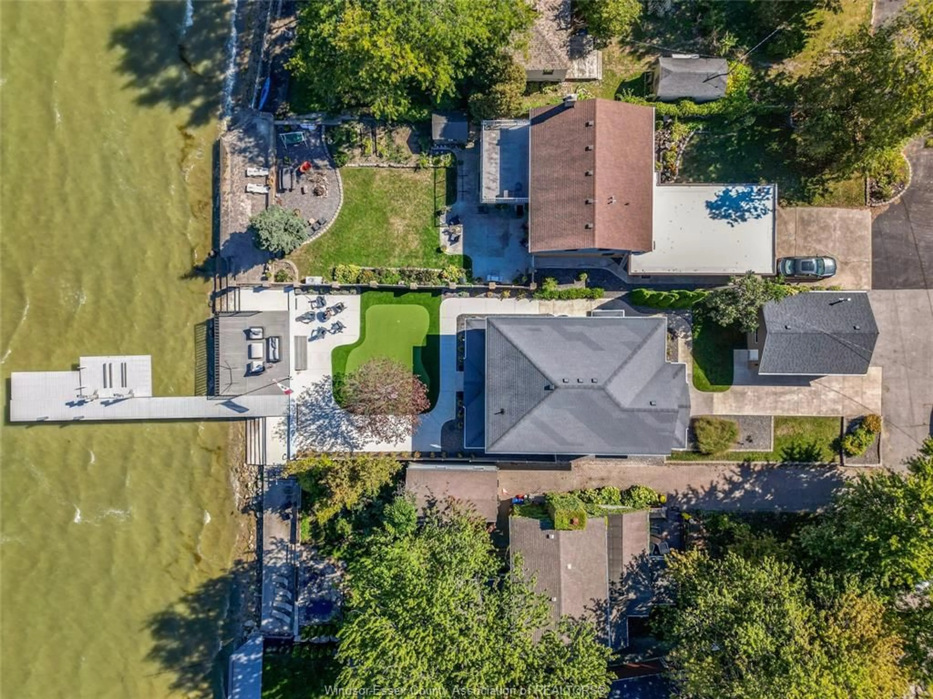 A pic from outside/outdoor area/front of a property/back of a property/a pic from drone, water/lake/river/ocean view for 435 LAKEVIEW, Belle River Ontario N8L 0M1