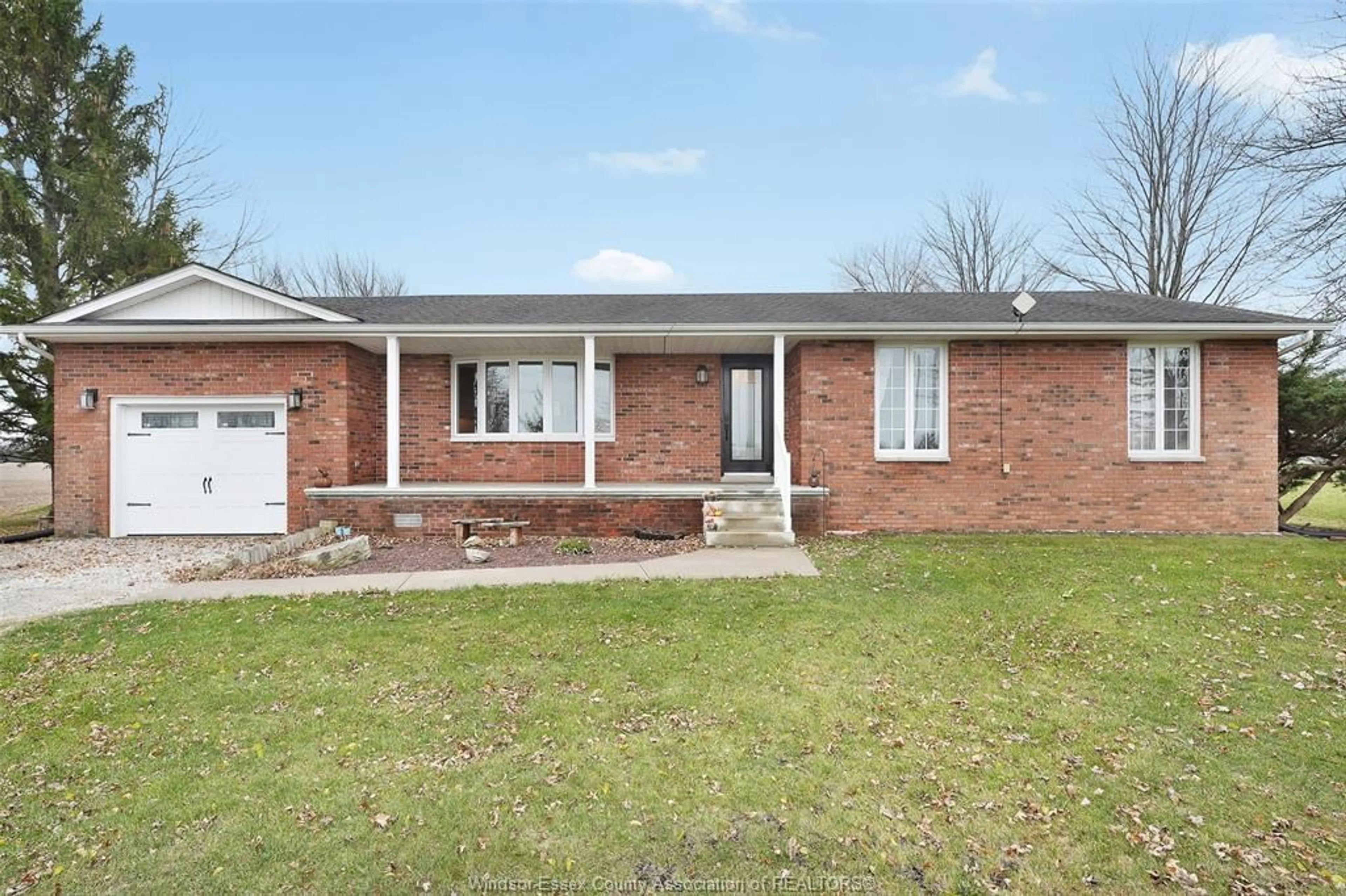 Home with brick exterior material, street for 527 COUNTY RD 42, Lakeshore Ontario N8N 2L9