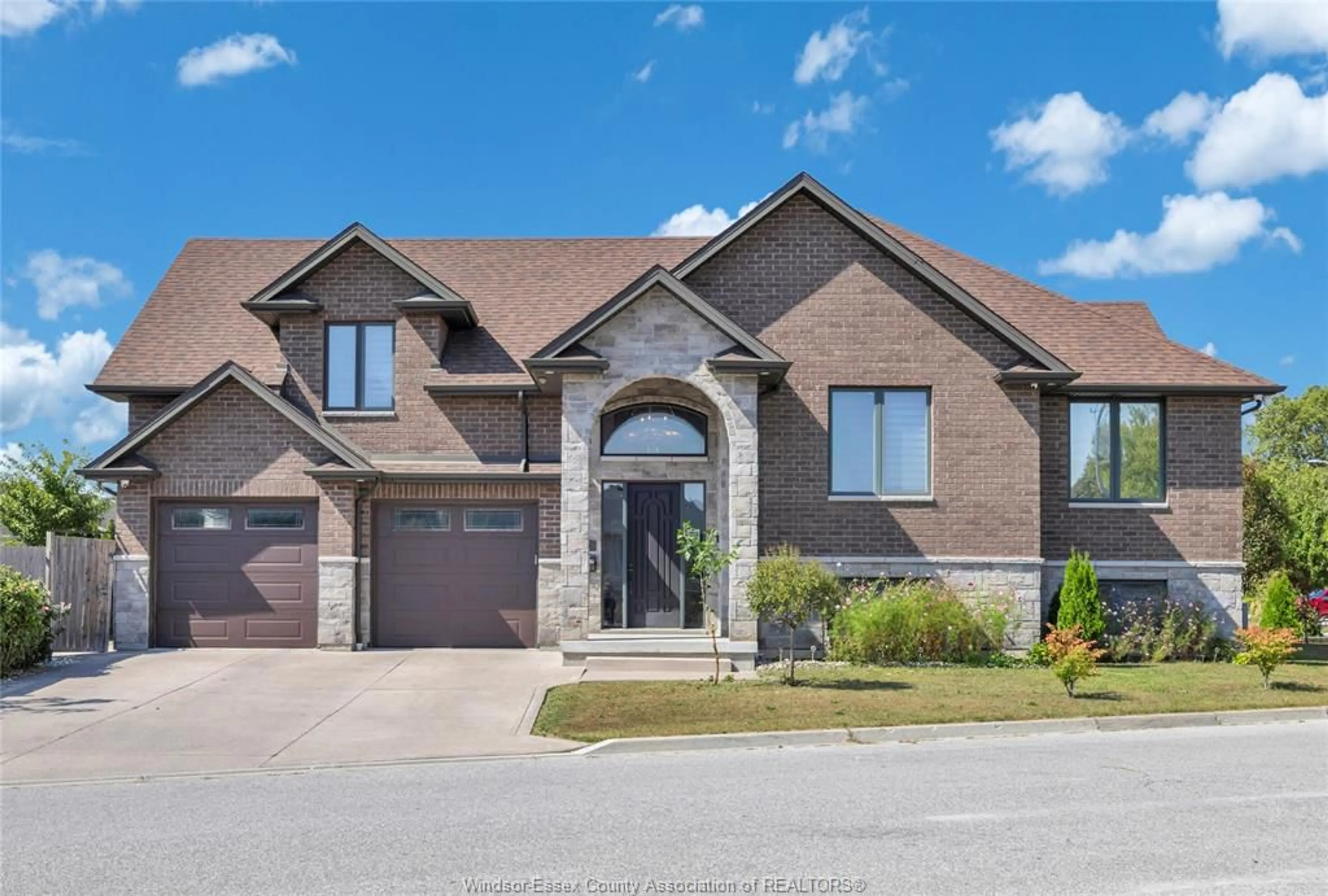 Home with brick exterior material, street for 498 SACRED HEART Dr, LaSalle Ontario N9J 0A6