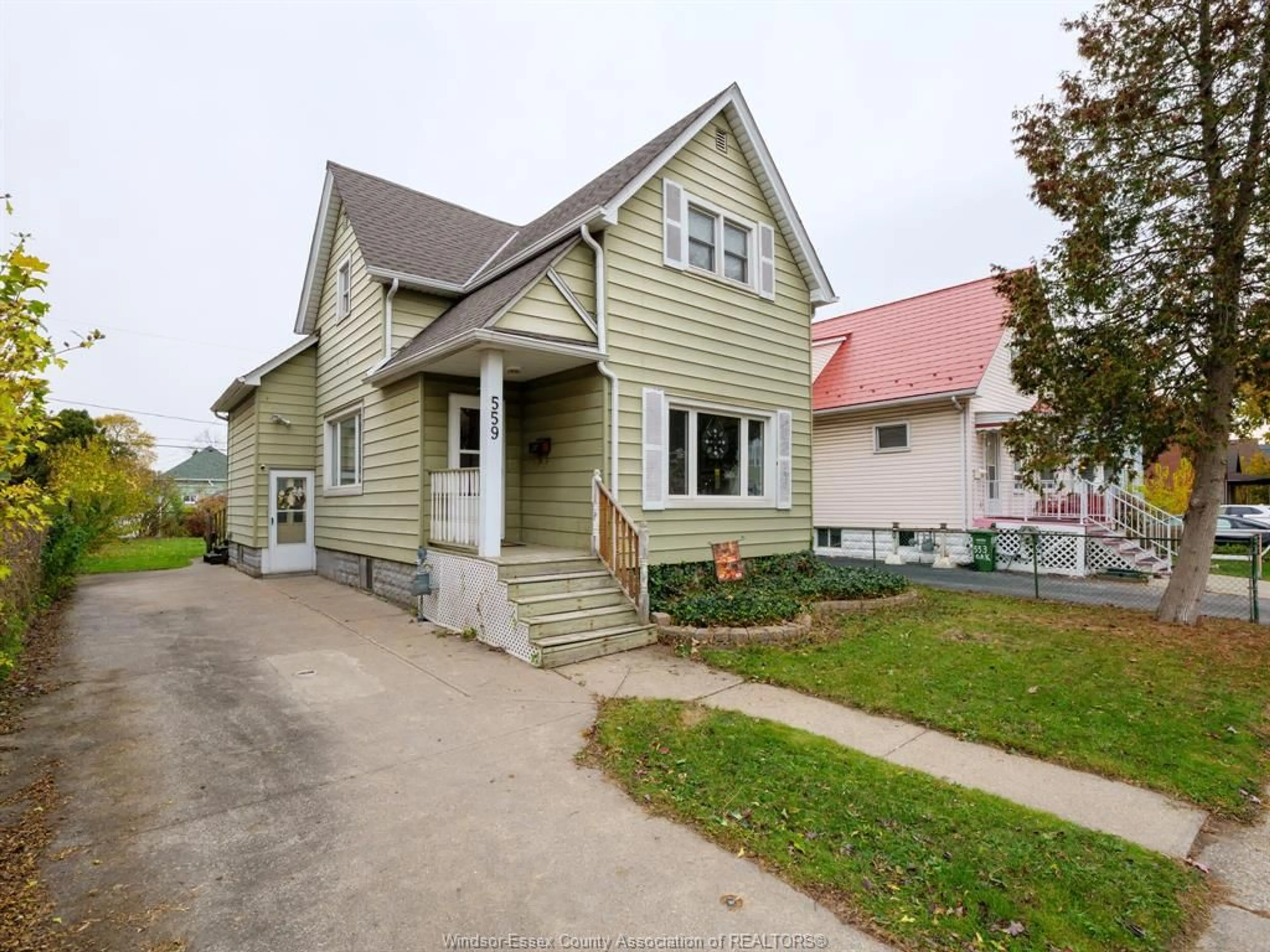 Home with vinyl exterior material, street for 559 OAK St, Windsor Ontario N9A 5E7