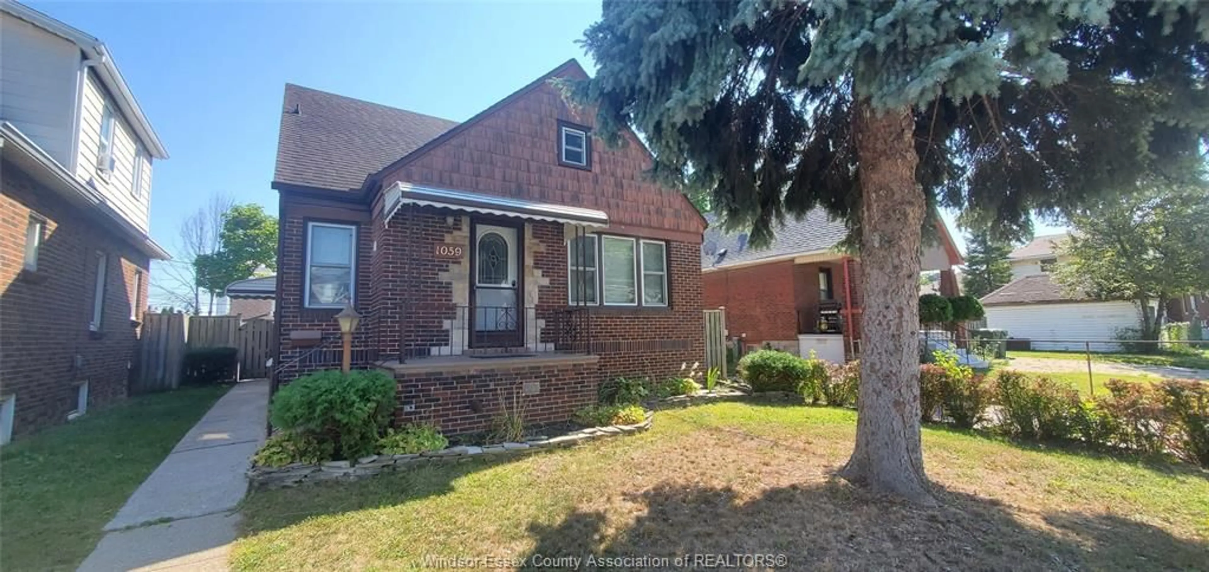 Home with brick exterior material, street for 1059 SHEPHERD St, Windsor Ontario N8X 2L6