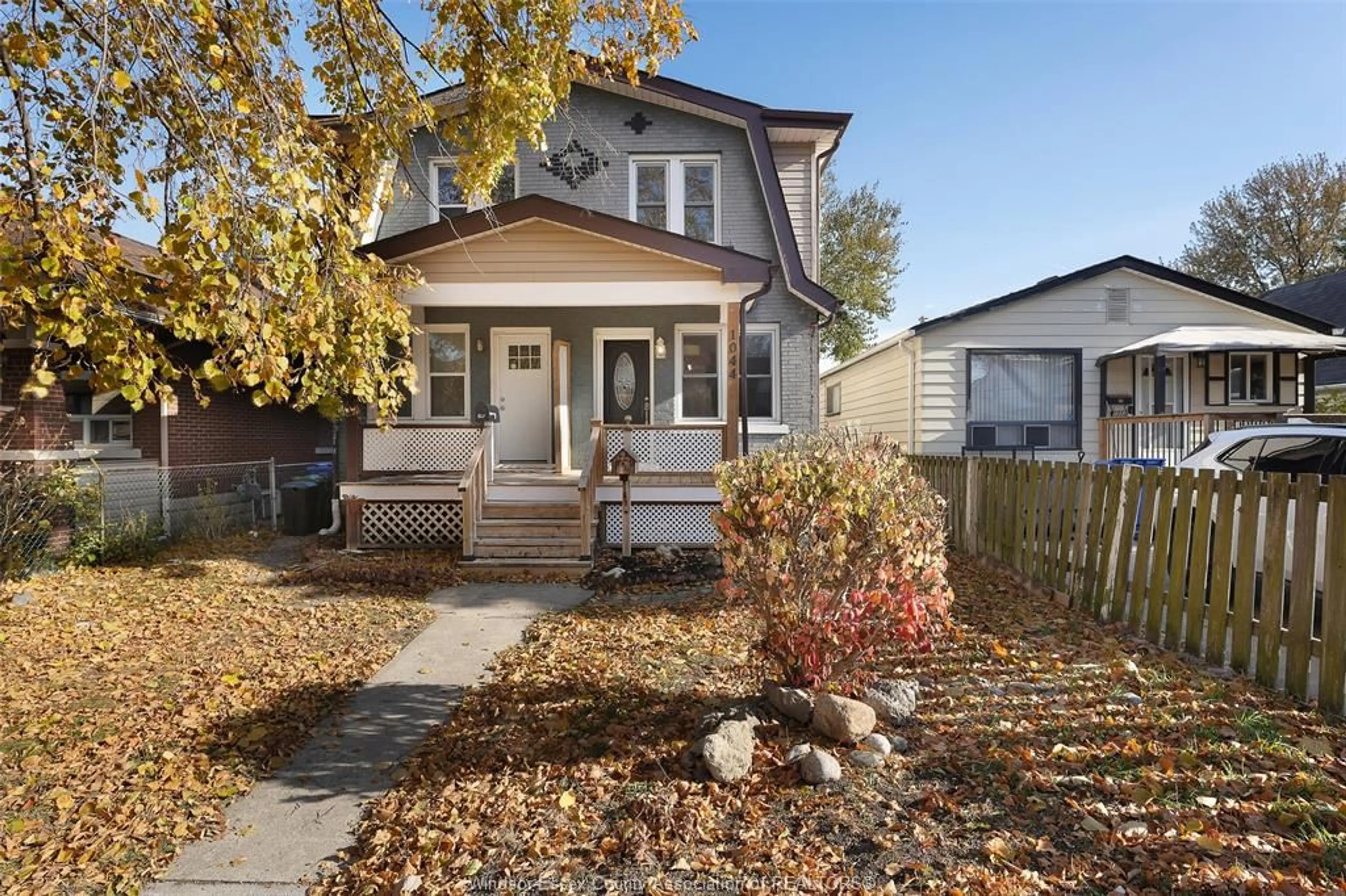 Home with vinyl exterior material, street for 1044 ELM Ave, Windsor Ontario N9A 5H7