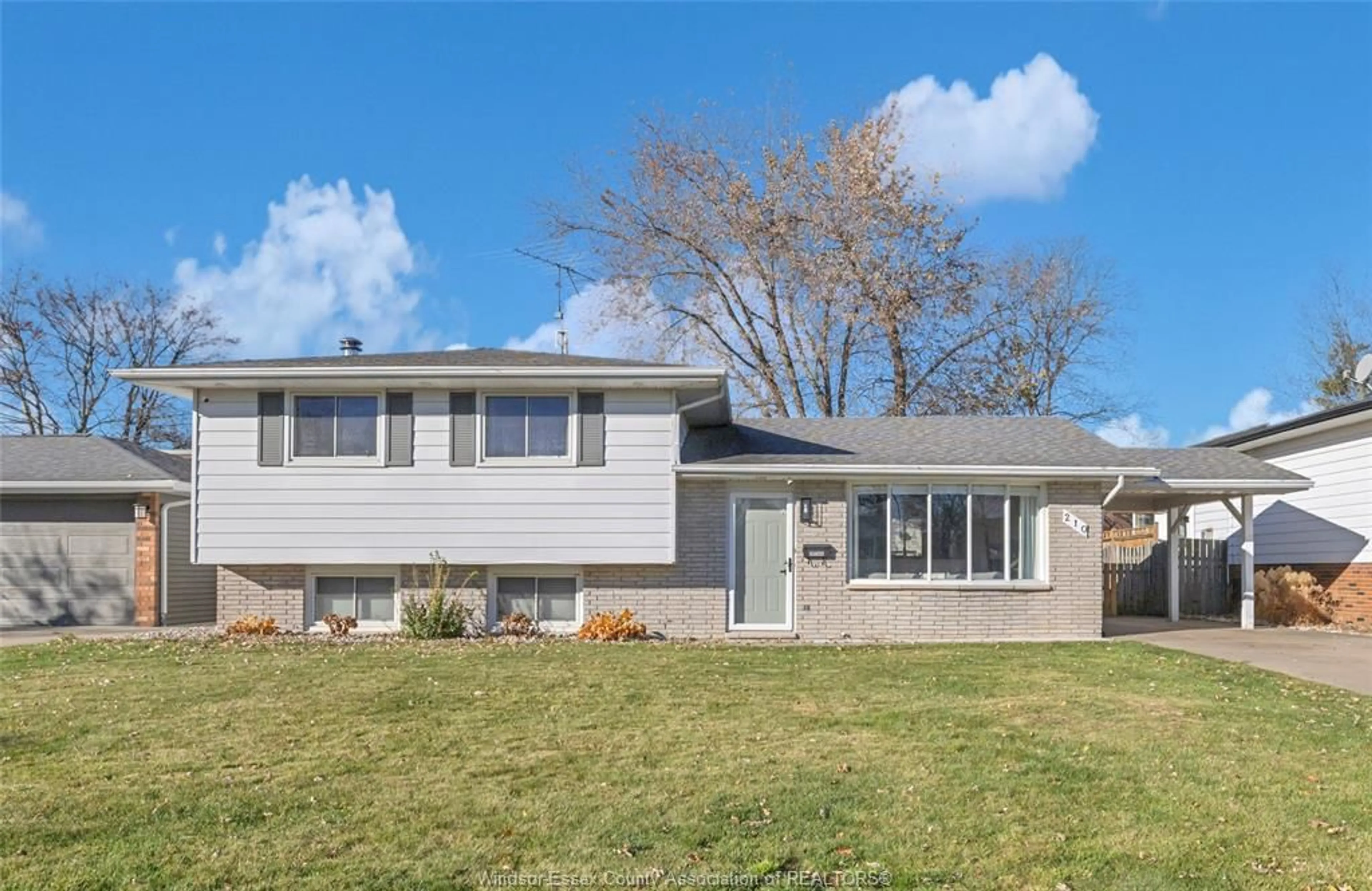 Home with vinyl exterior material, street for 210 Westlawn Ave, Kingsville Ontario N9Y 3L9