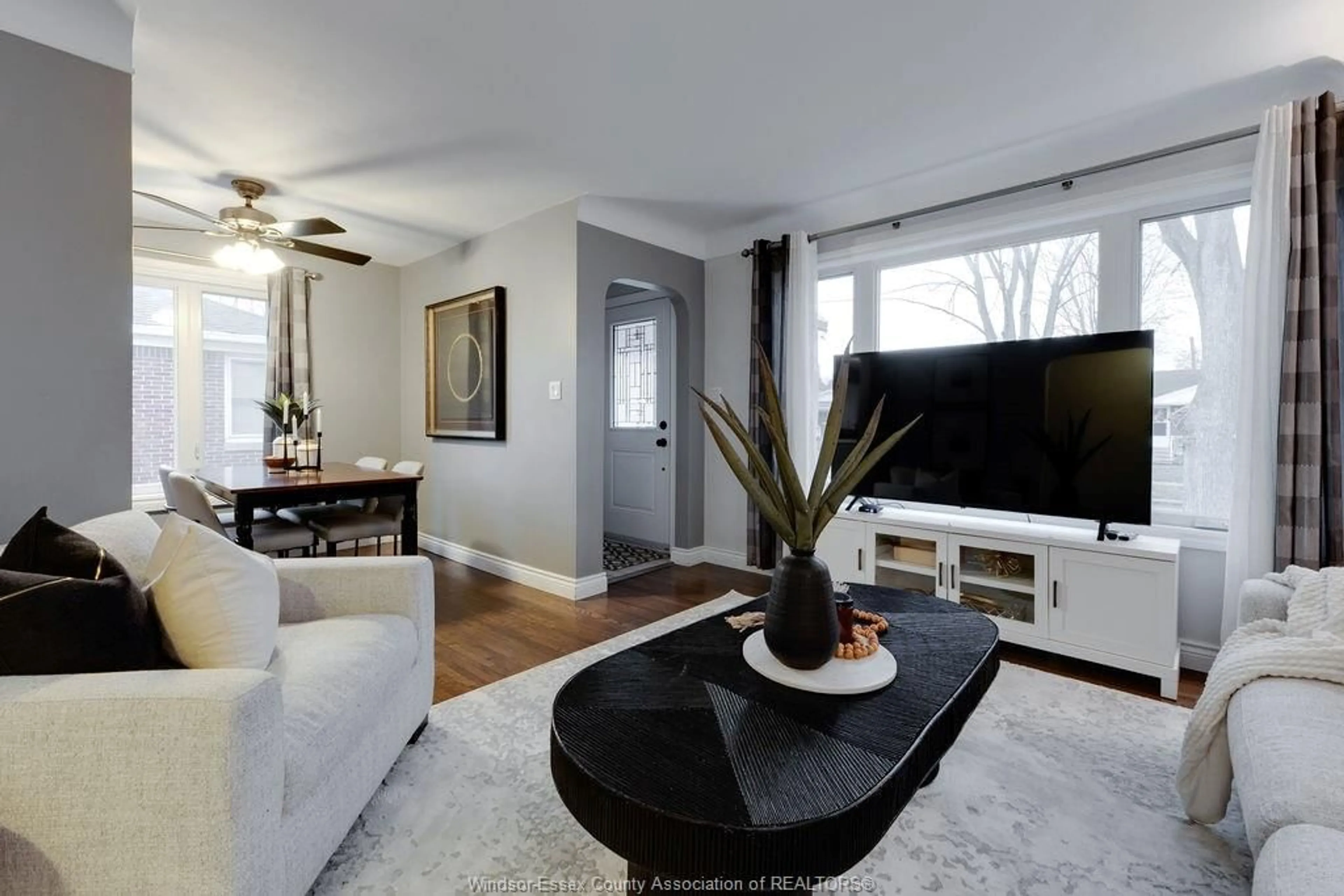 Living room with furniture, wood/laminate floor for 2584 RANDOLPH Ave, Windsor Ontario N9E 3C9