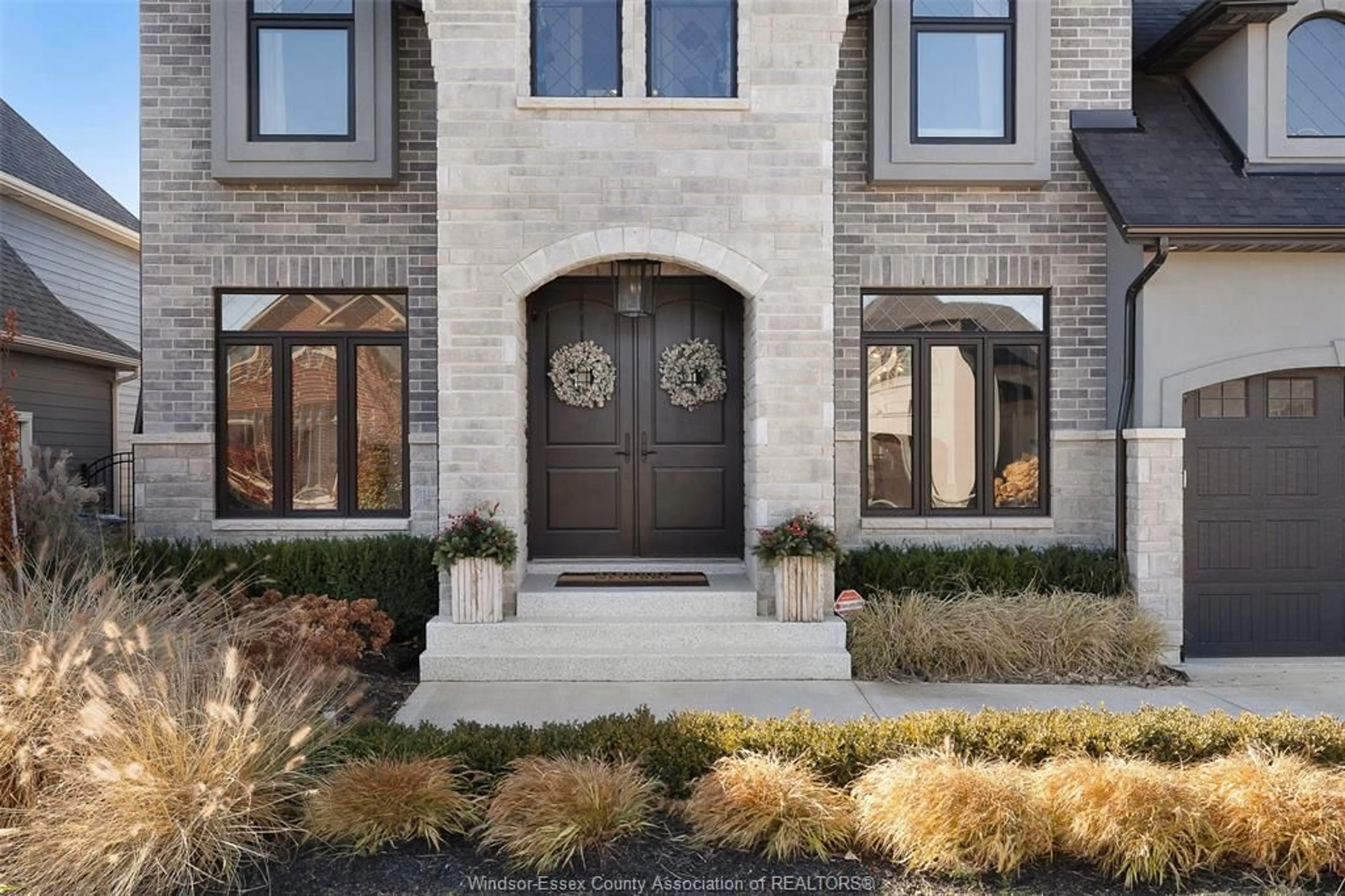 Home with brick exterior material, street for 933 CHATEAU Ave, Windsor Ontario N8P 0E6