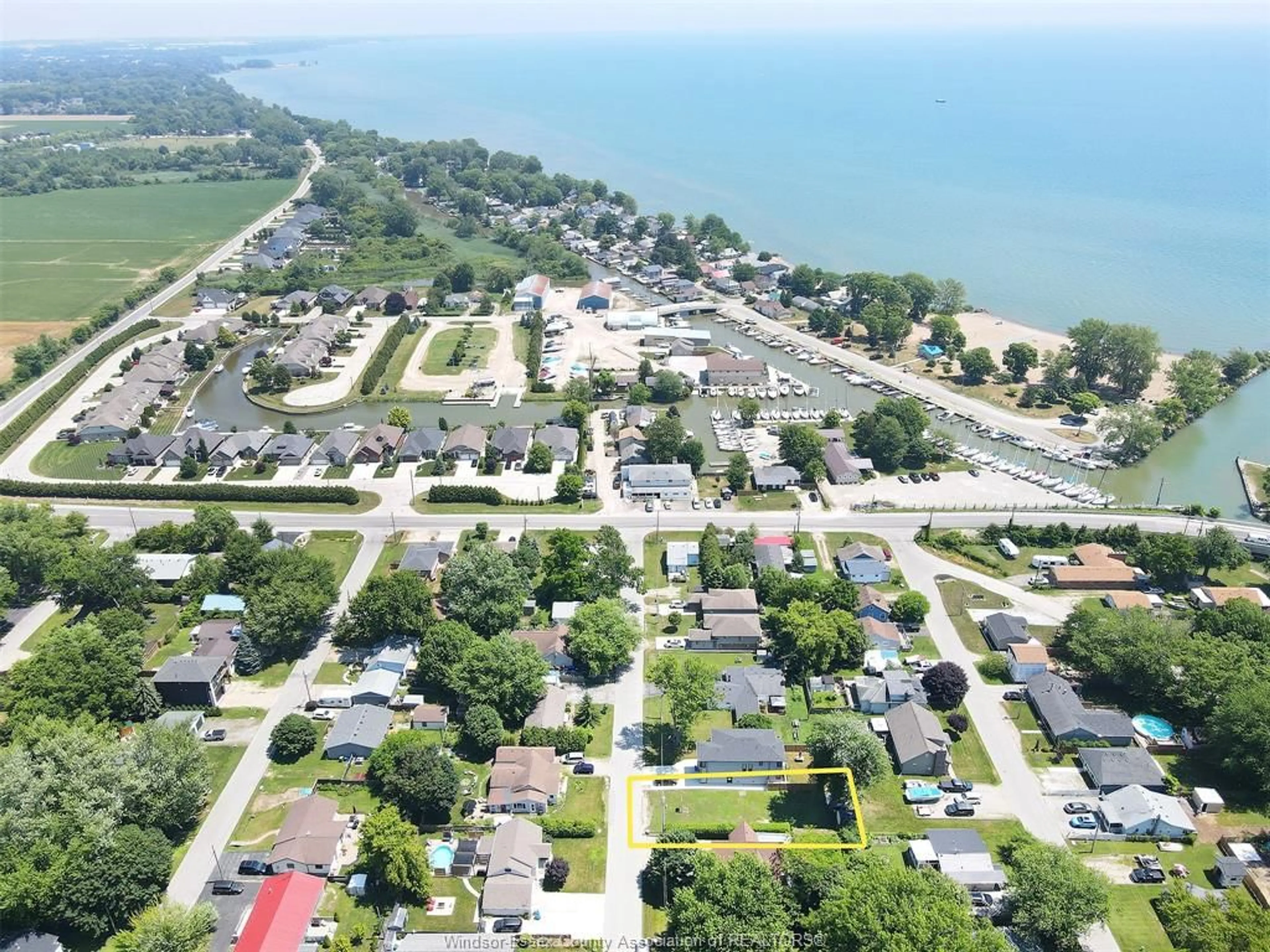 A pic from outside/outdoor area/front of a property/back of a property/a pic from drone, street for 1047 CHERRY, Kingsville Ontario N9Y 3V7