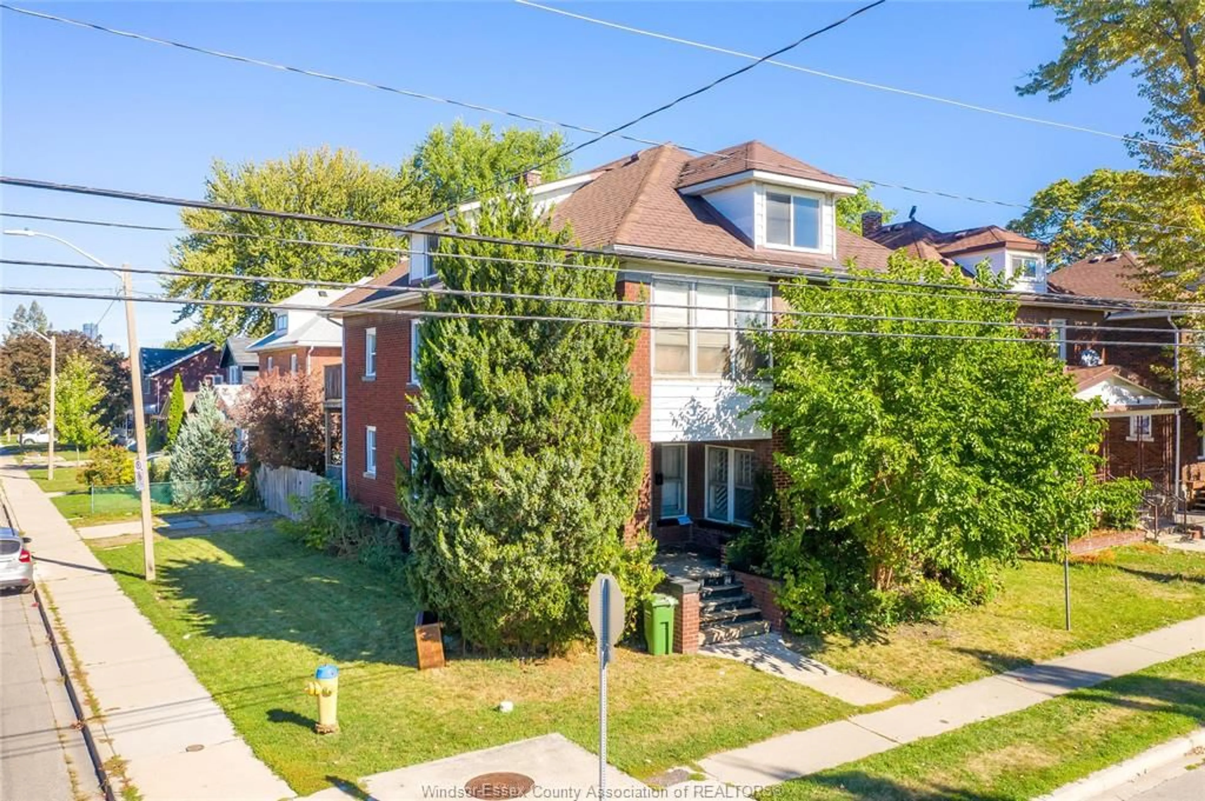 A pic from outside/outdoor area/front of a property/back of a property/a pic from drone, street for 106-108 SHEPHERD St, Windsor Ontario N8X 2K3