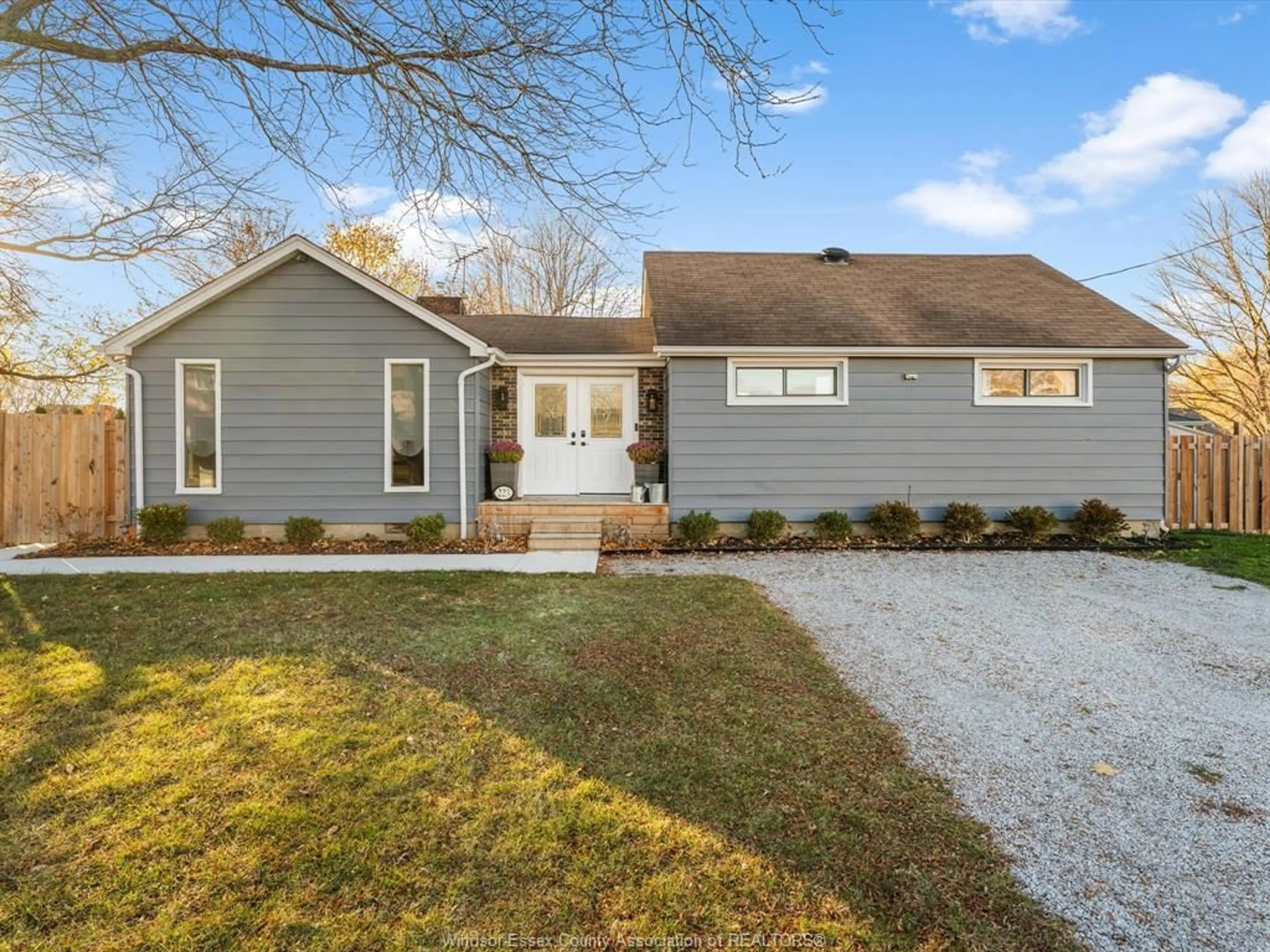 Home with vinyl exterior material, street for 223 CARUHEL Dr, Lakeshore Ontario N0R 1C0