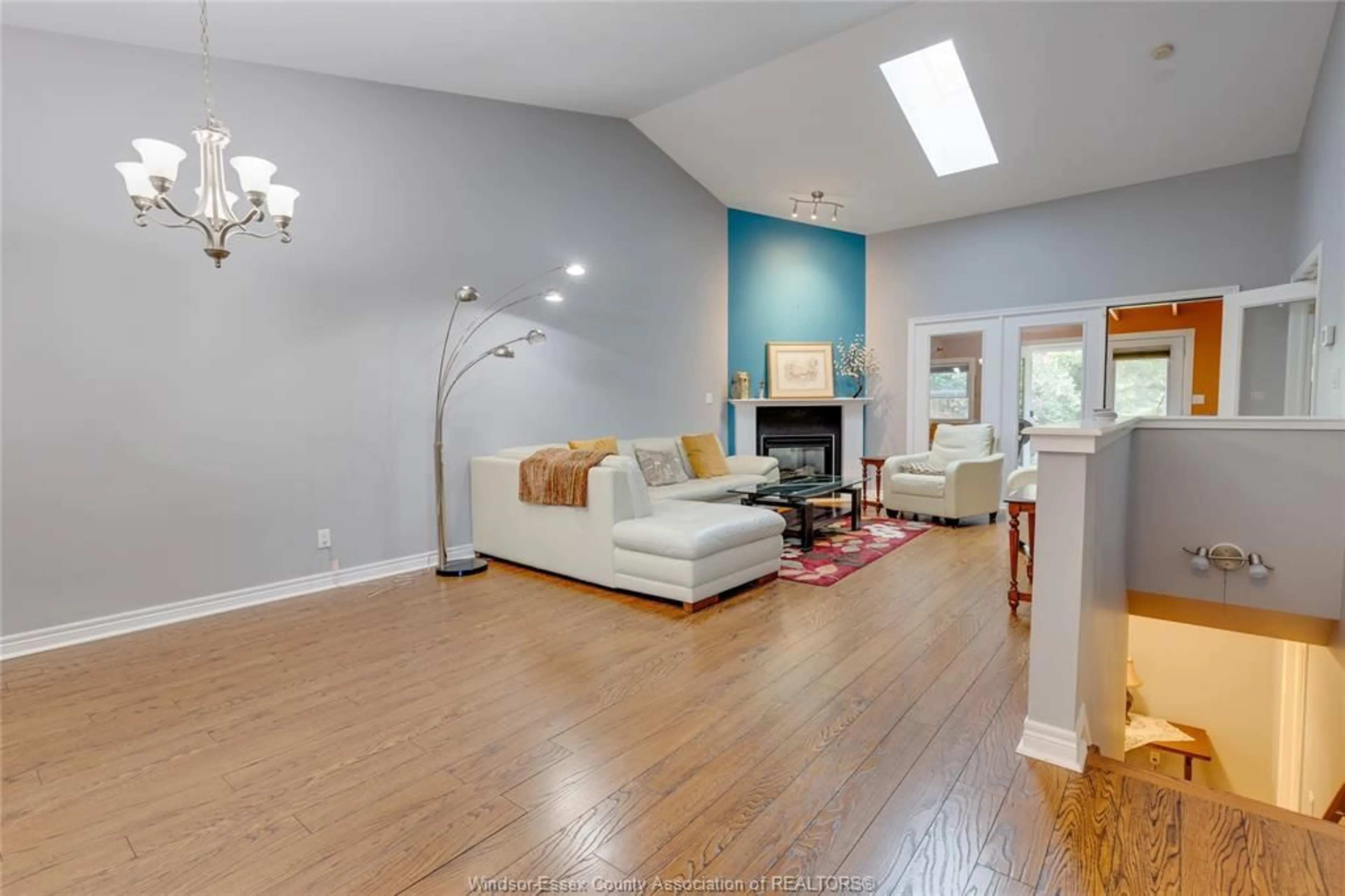 Living room with furniture, wood/laminate floor for 330 SADDLE Lane, Kingsville Ontario N9Y 4A6