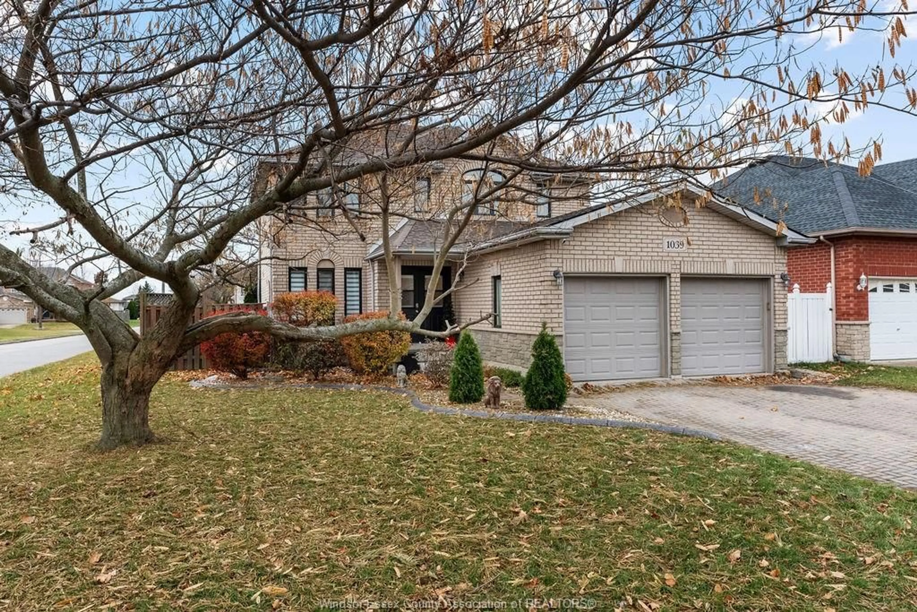 Home with vinyl exterior material, street for 1039 CORA GREENWOOD, Windsor Ontario N8P 1K2