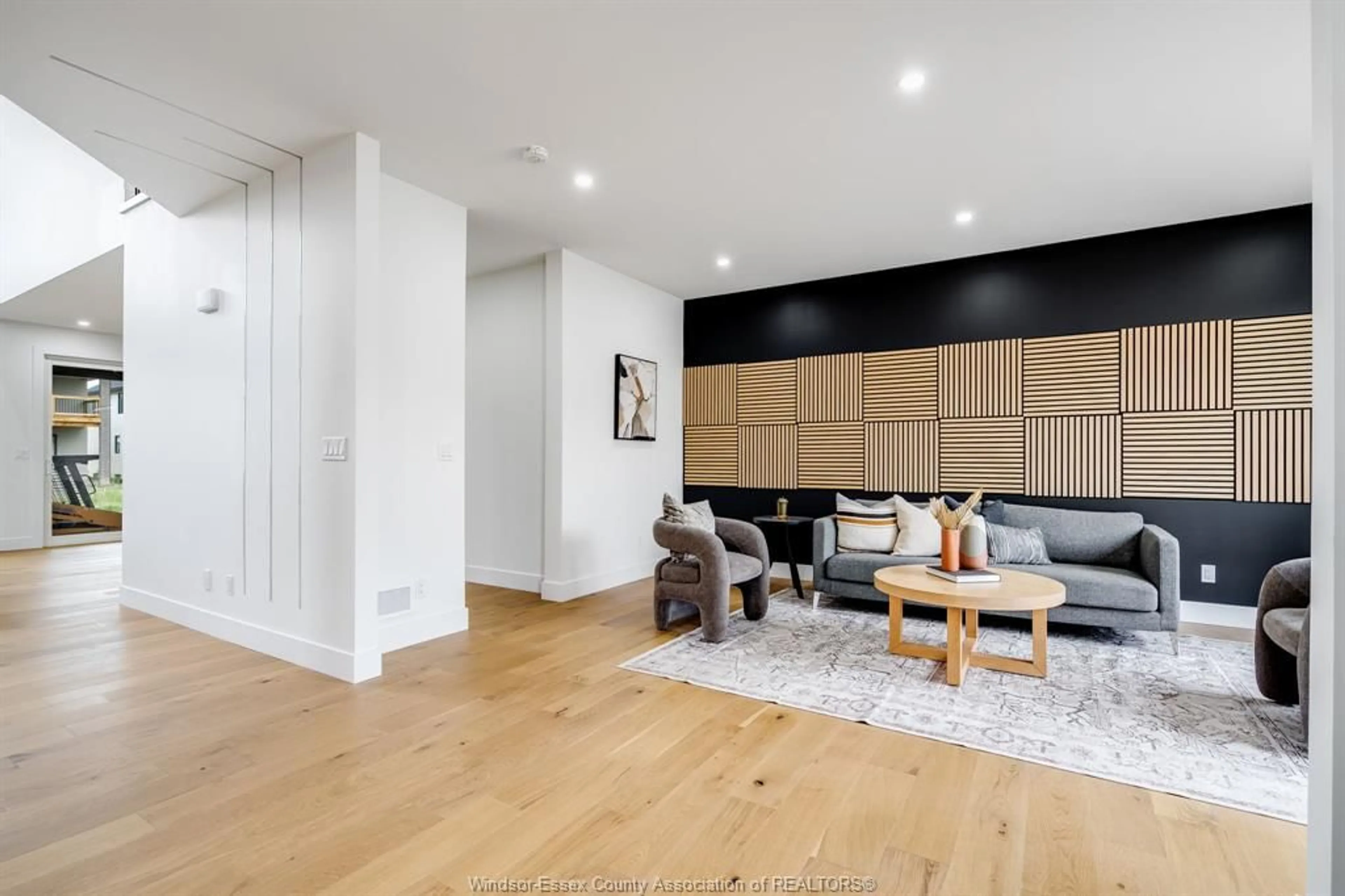 Living room with furniture, wood/laminate floor for 186 Whelan, Amherstburg Ontario N9V 0G9