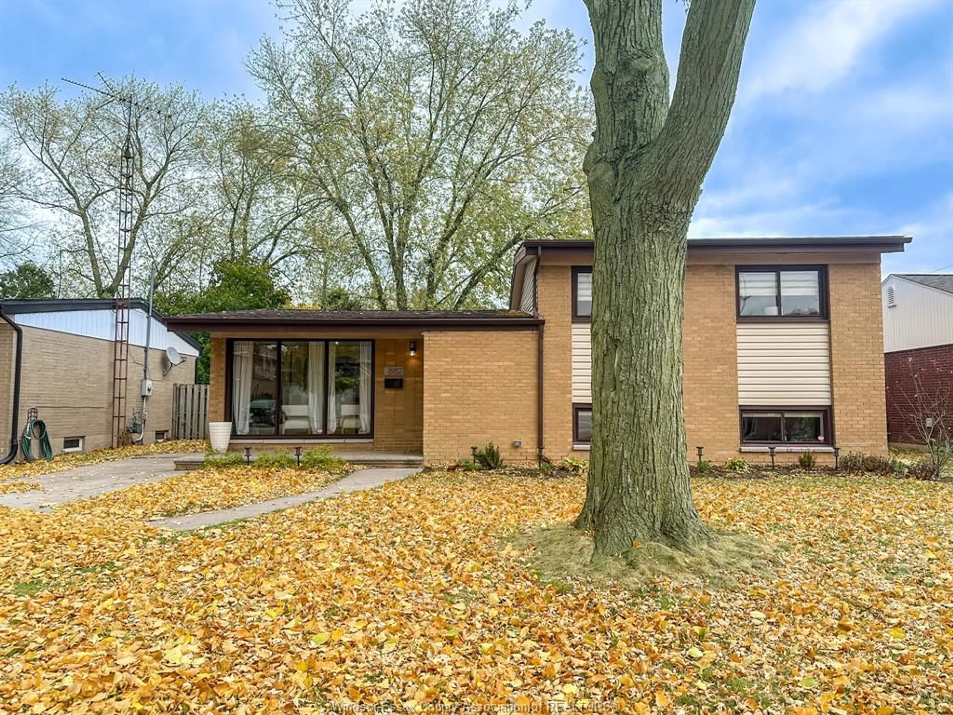Home with brick exterior material, street for 882 WESTCHESTER, Windsor Ontario N8S 3Y7