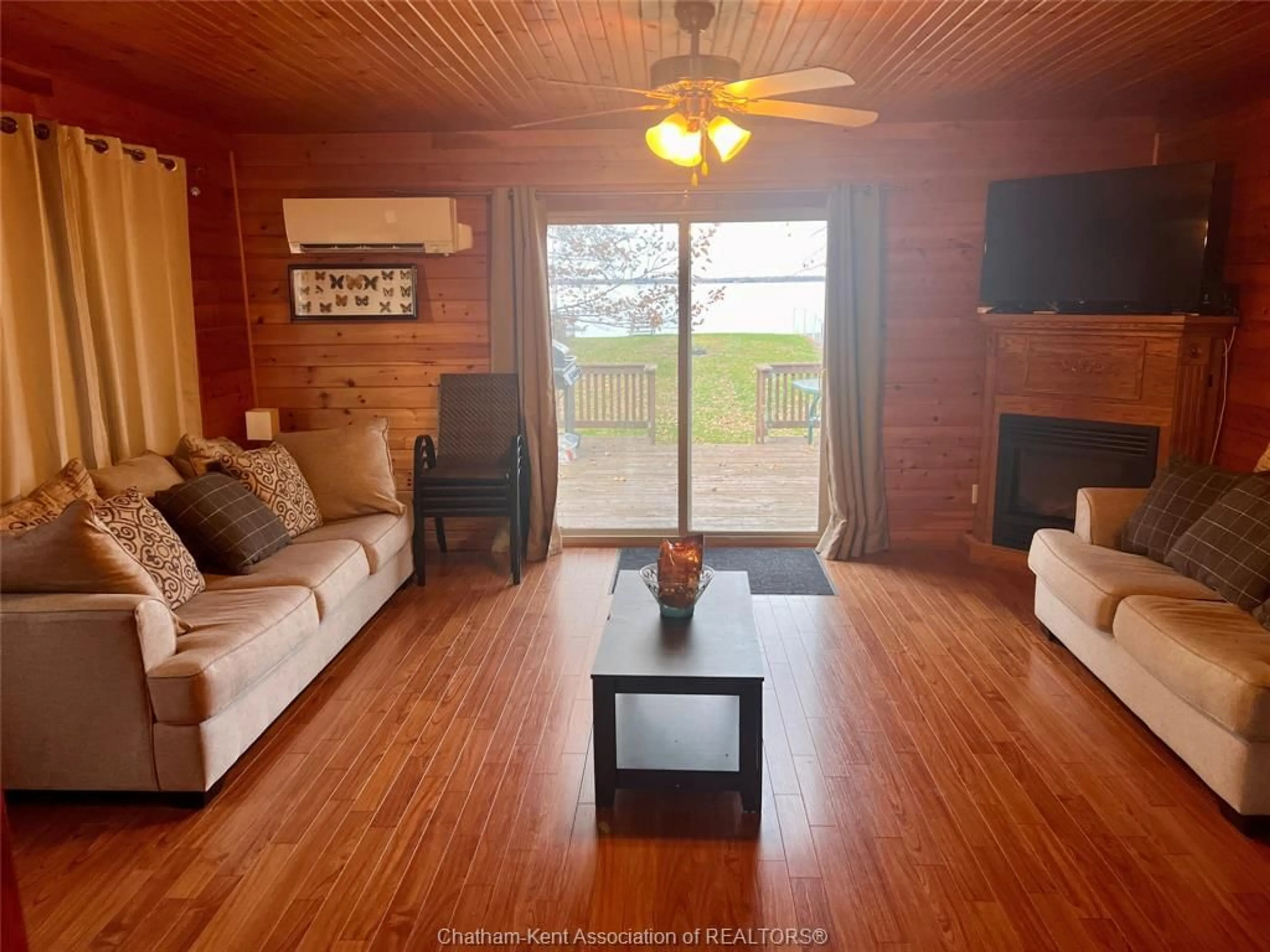 Living room with furniture, wood/laminate floor for 3 Stass Lane, Erieau Ontario N0P 1N0