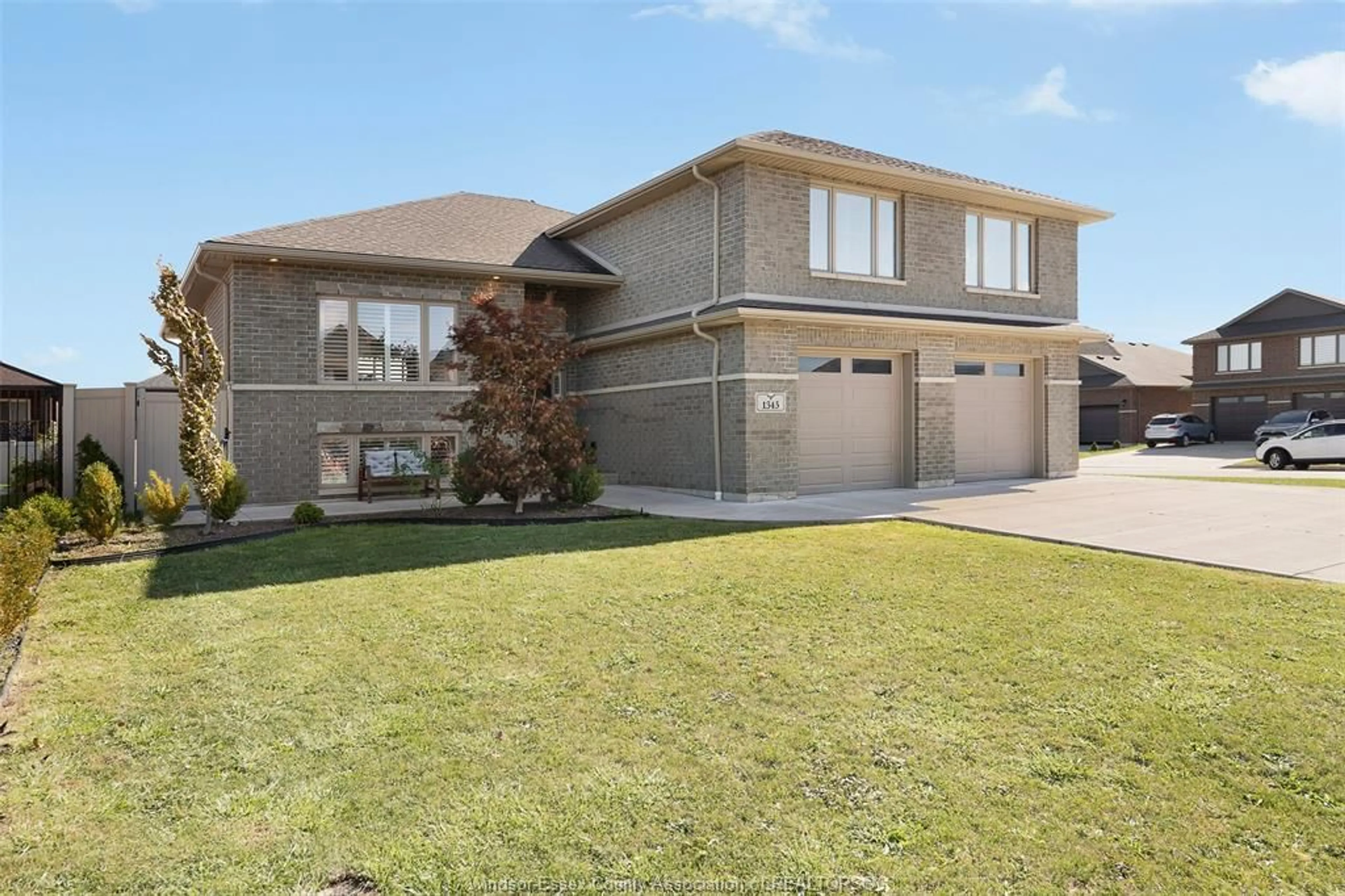 Home with brick exterior material, street for 1345 DEER RUN TRAIL, Lakeshore Ontario N8L 0T4