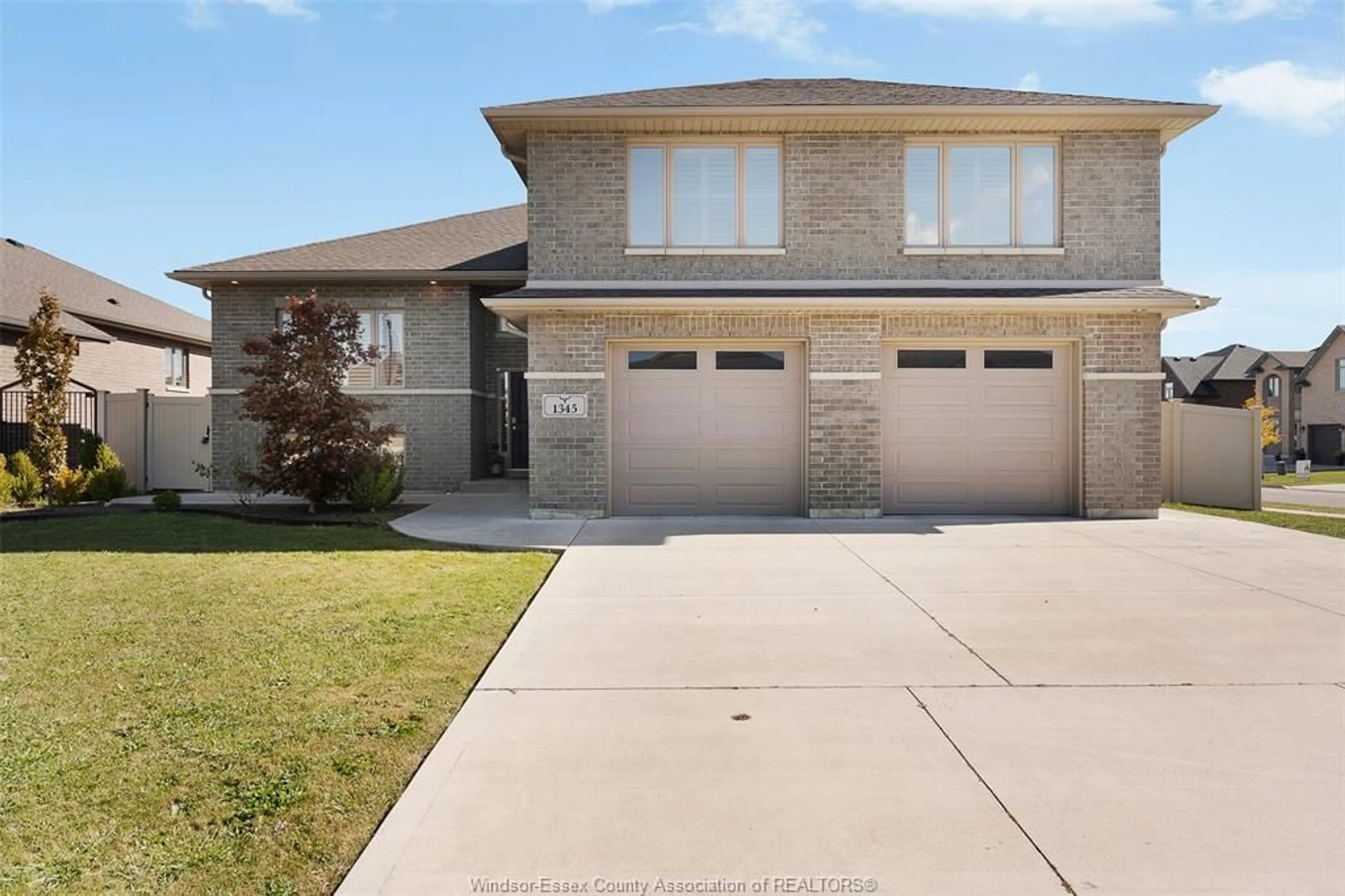 Home with brick exterior material, street for 1345 DEER RUN TRAIL, Lakeshore Ontario N8L 0T4