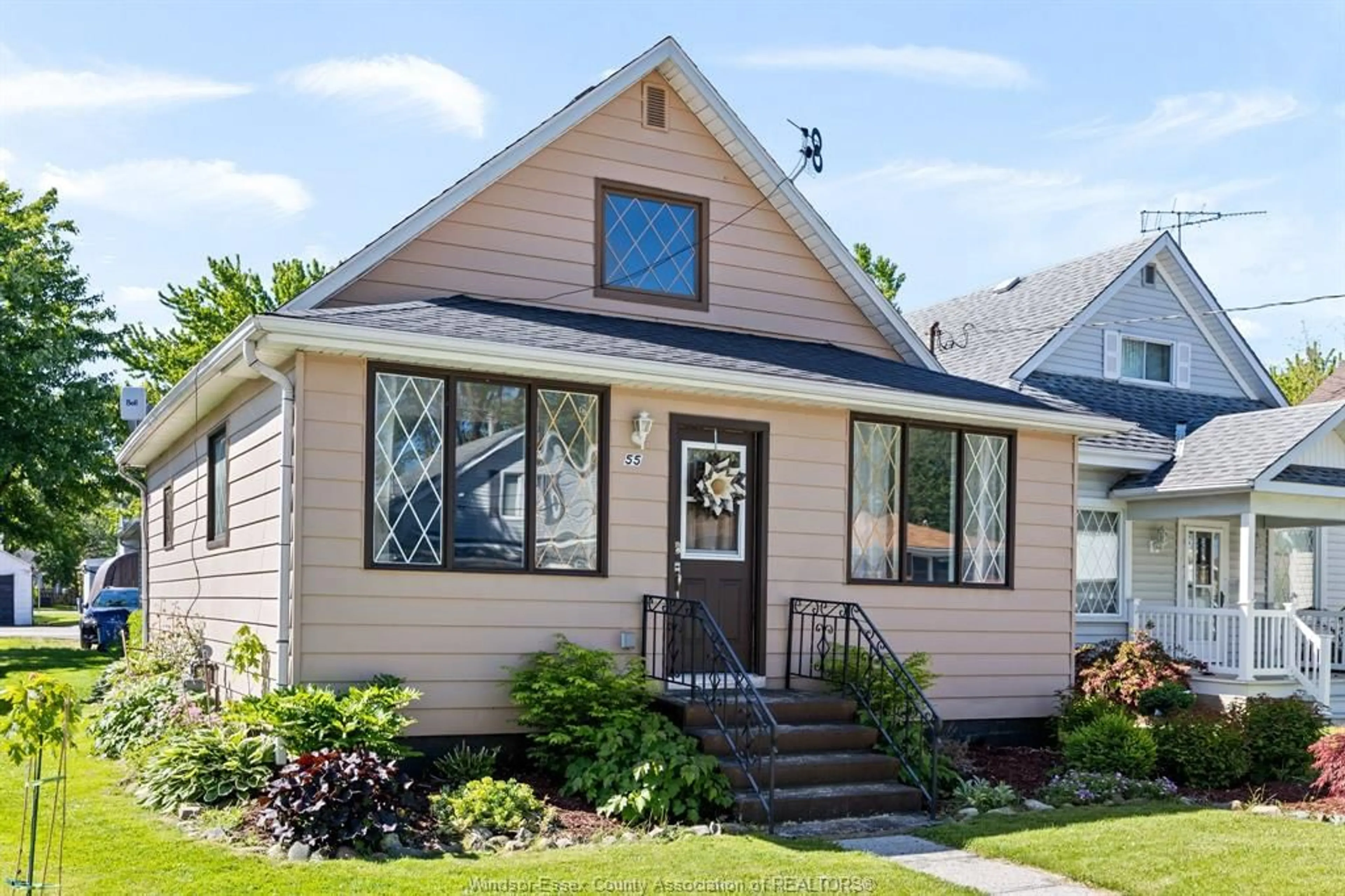 Home with vinyl exterior material, street for 55 CANAL, Tilbury Ontario N0P 2L0