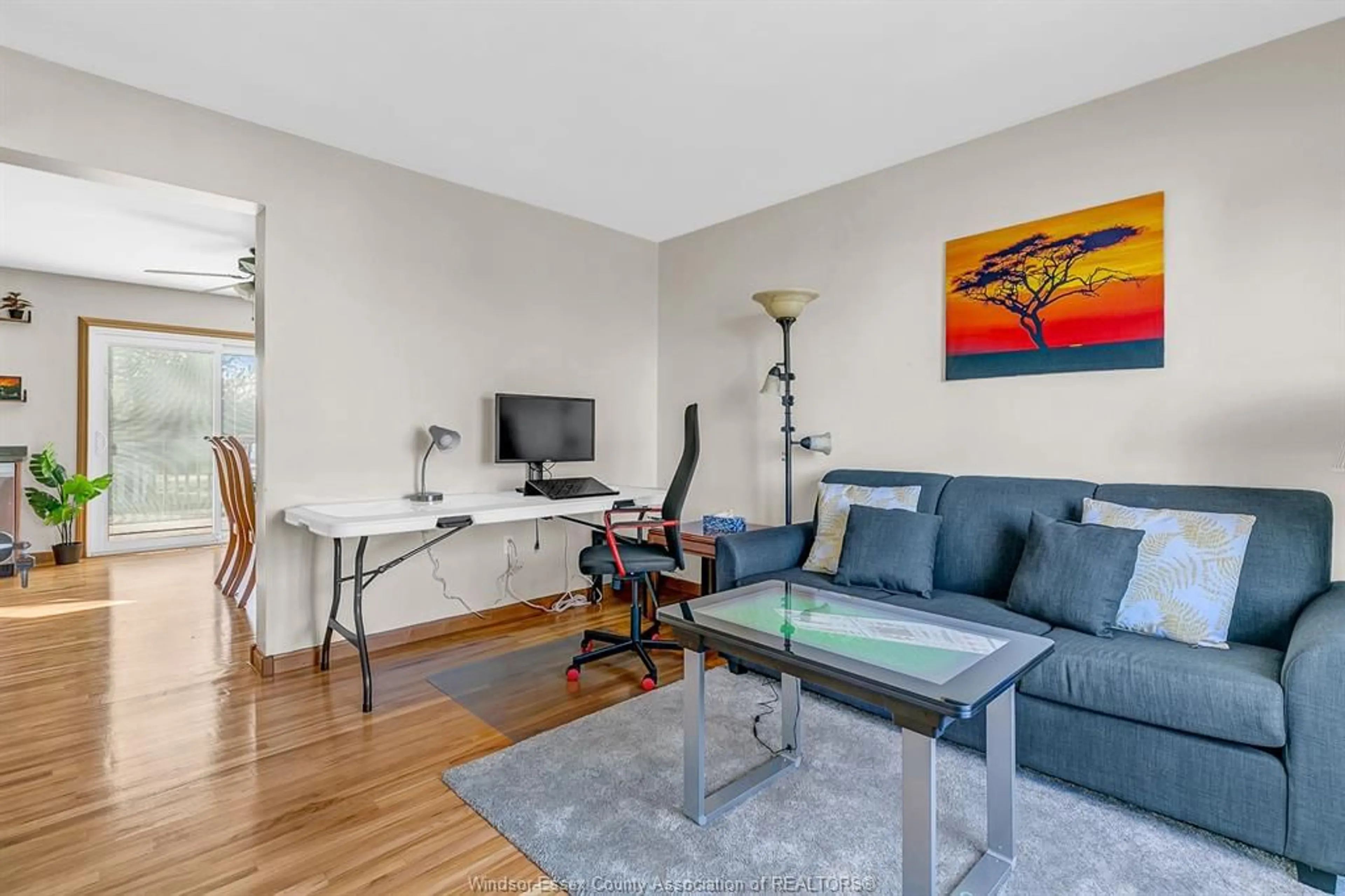 Living room with furniture, wood/laminate floor for 405 RIVER Ave, LaSalle Ontario N9J 1A1