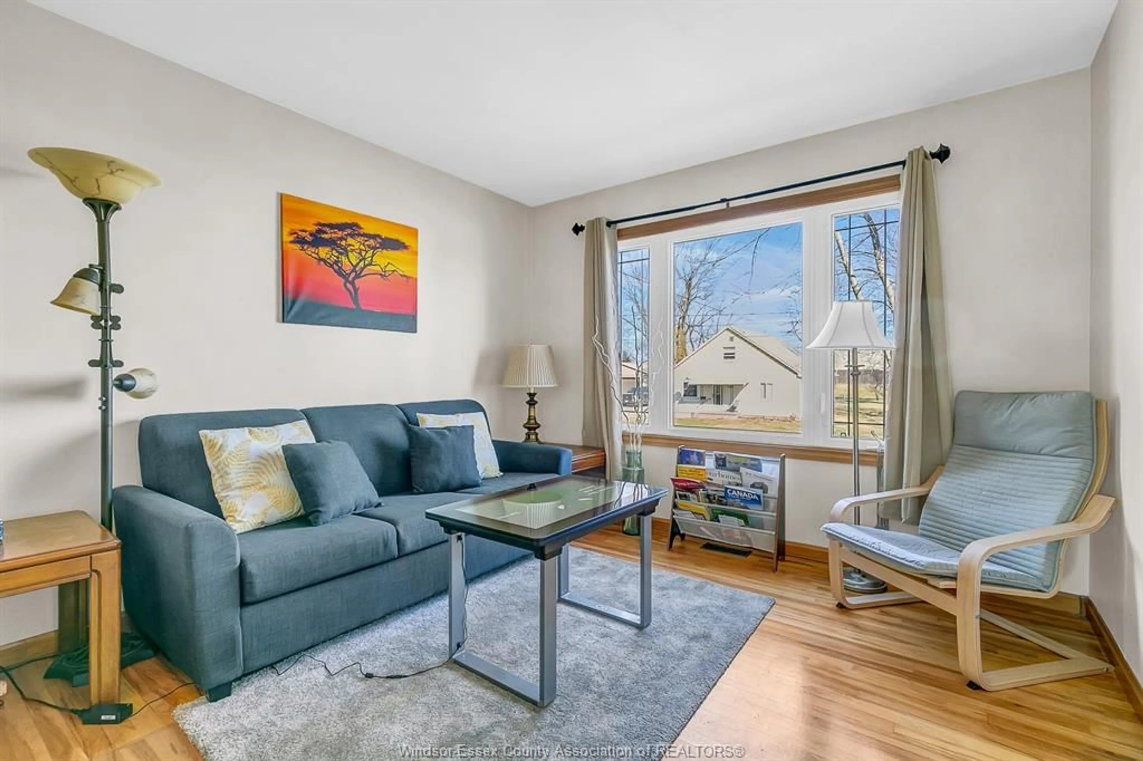 Living room with furniture, wood/laminate floor for 405 RIVER Ave, LaSalle Ontario N9J 1A1