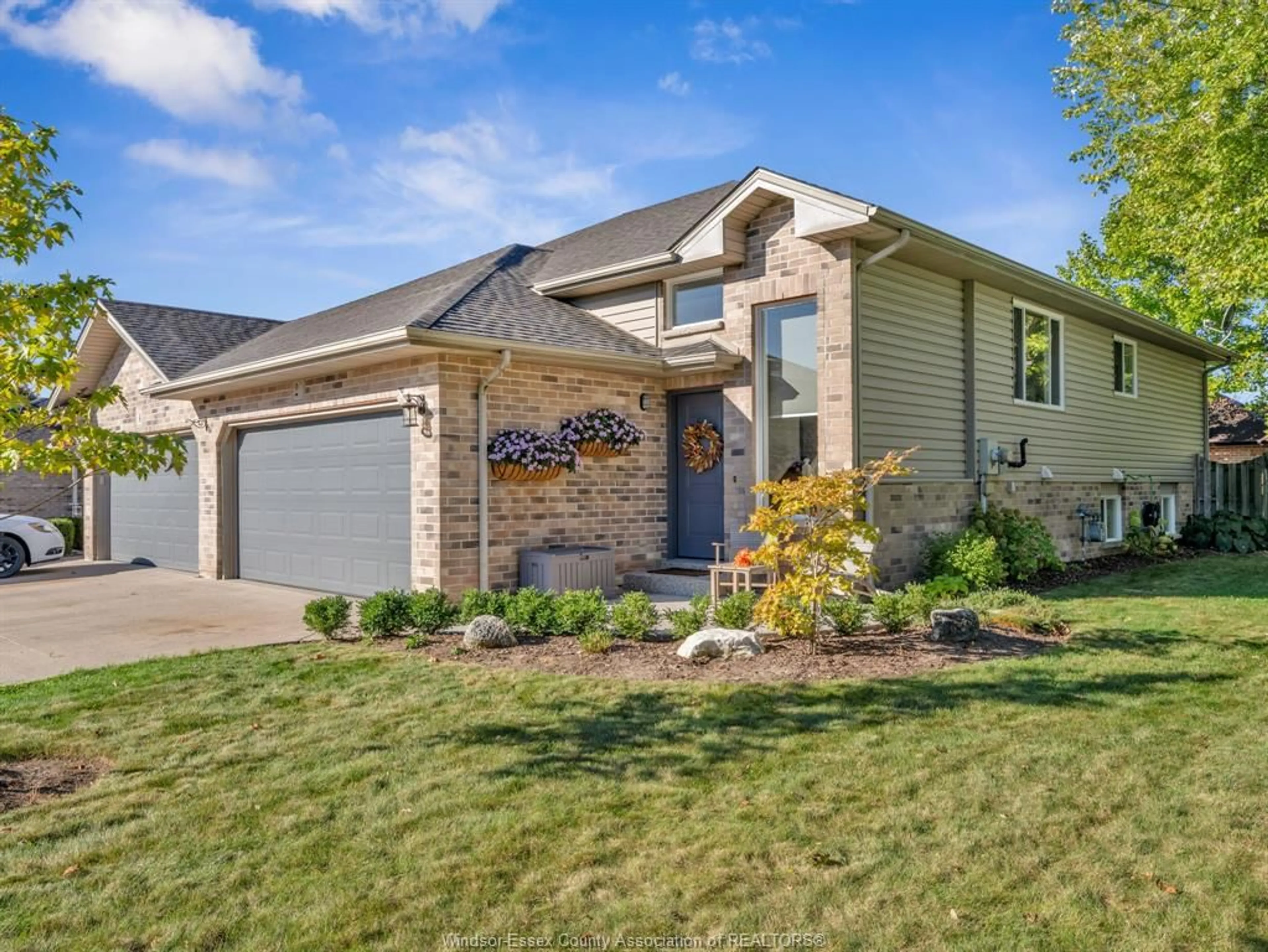 Home with brick exterior material, street for 2 Normandy Ave, Kingsville Ontario N9Y 4B9