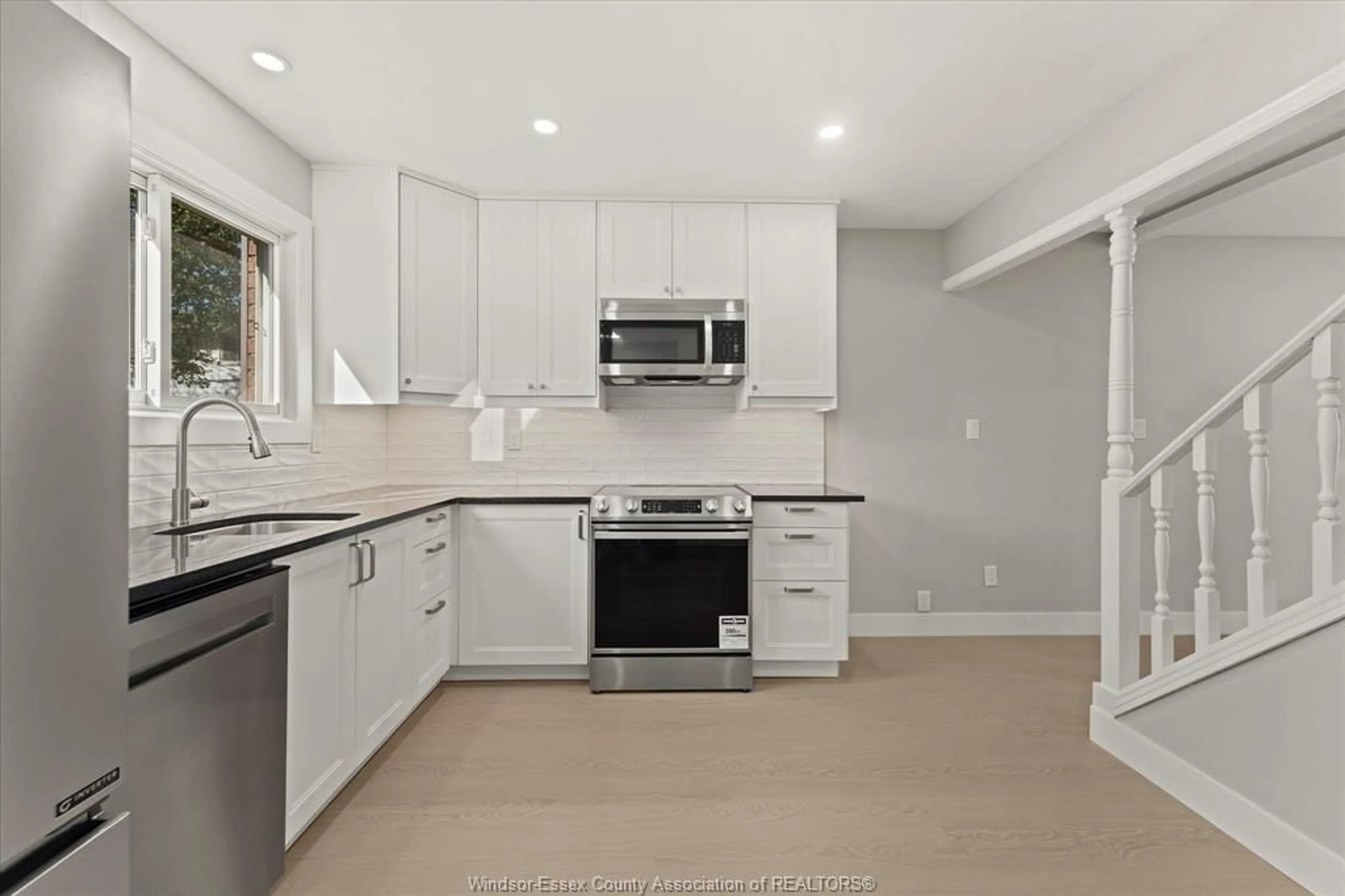 Open concept kitchen, ceramic/tile floor for 2960 MEADOWBROOK Lane #2, Windsor Ontario N8T 3C8