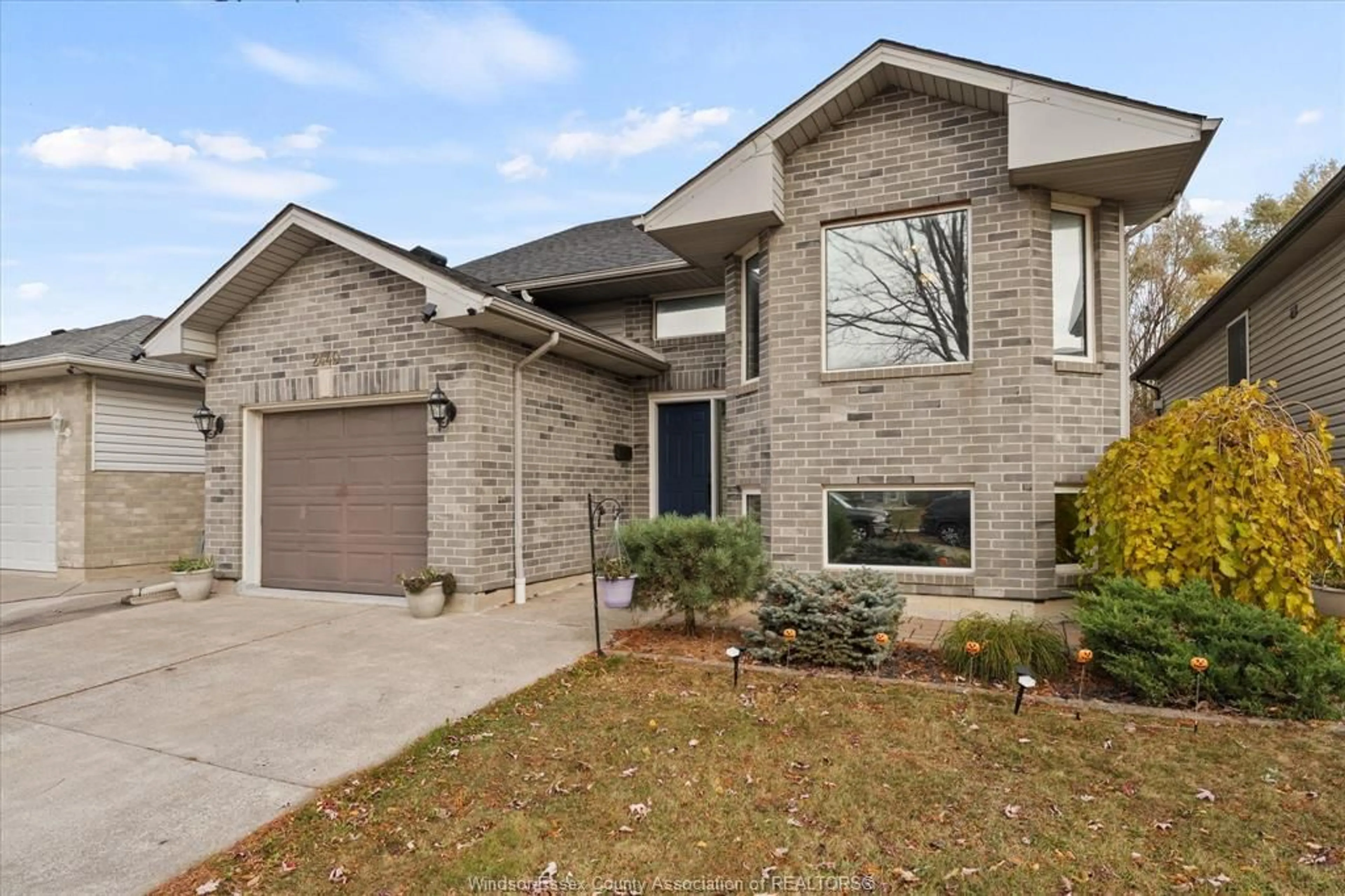 Home with brick exterior material, street for 2440 TIMBERCREST, Windsor Ontario N8P 1S2